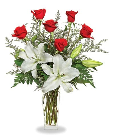 Lilies and Roses  - Red roses and pure white lilies are two of the most elegant blossoms in nature; combined in one lovely floral arrangement, they create double the flower power!  A simple and elegant display that will make someone sit up and take notice.