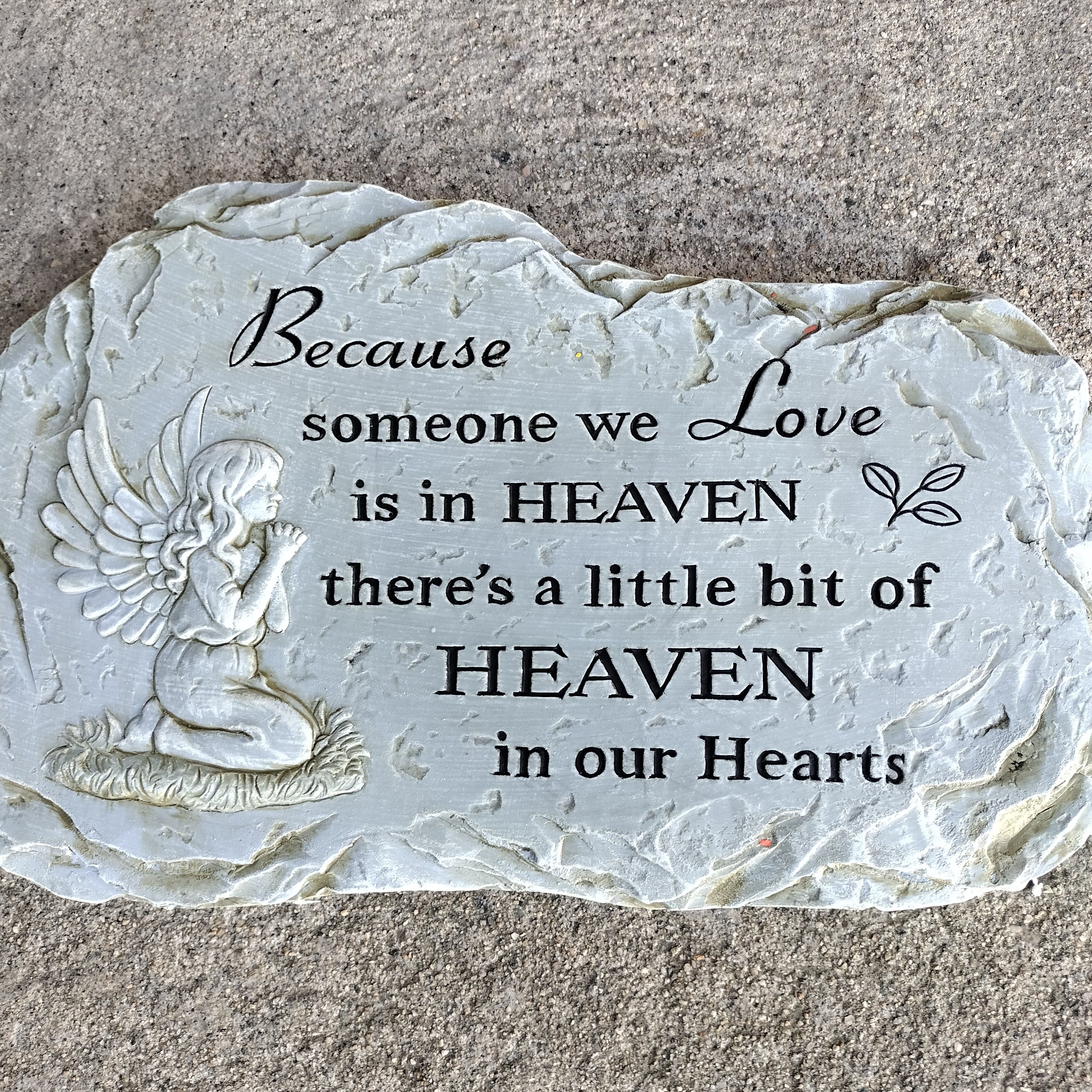 Because Someone We Love Is In Heaven Angel Stepping Stone with stand - All weather resin stepping stone with stand for display purposes. Inscription on stone reads &quot;Because someone we love is in Heaven there's a little bit of Heaven in our hearts.&quot;