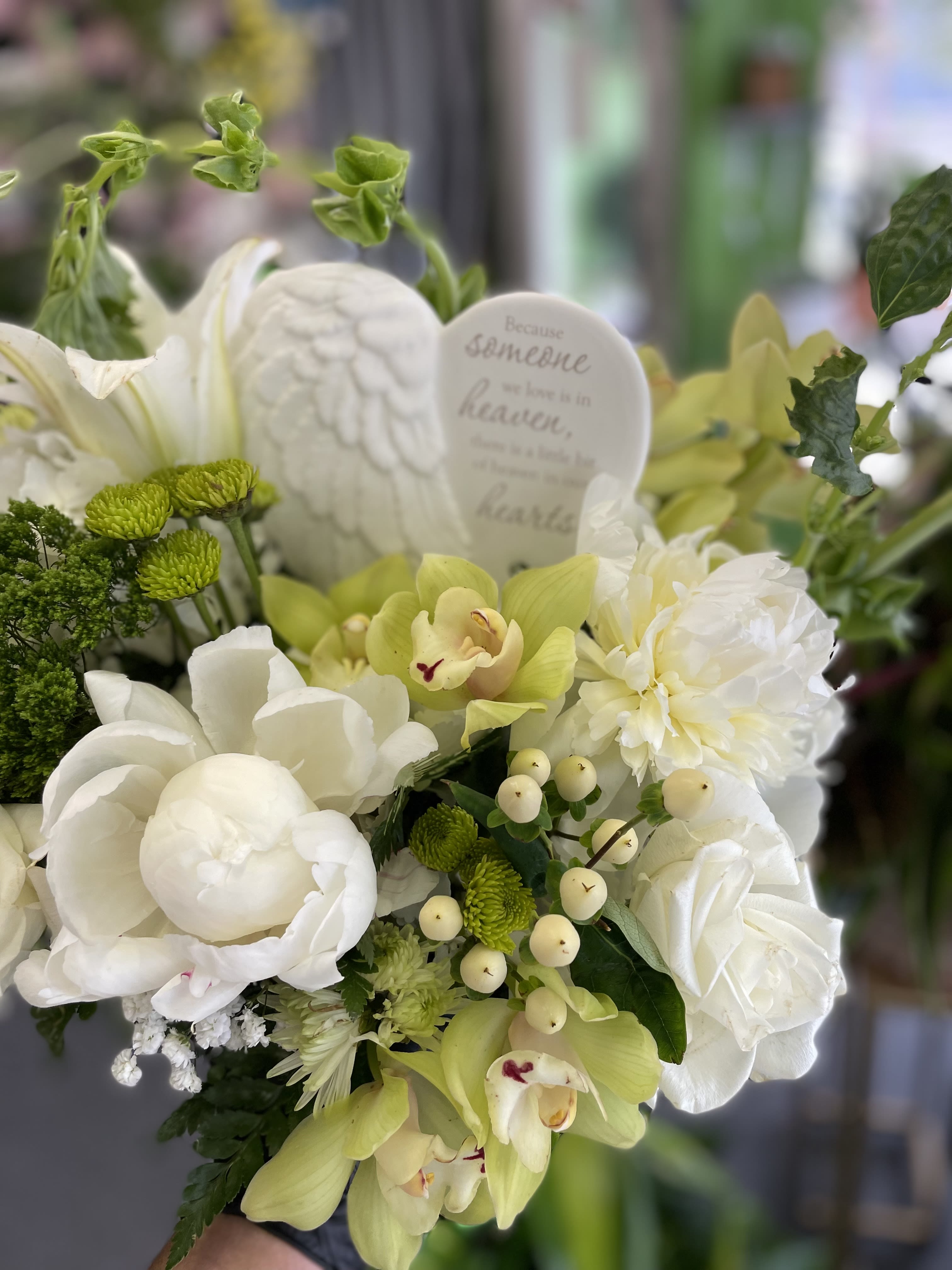 Heaven scent  - This beautiful arrangement has white combinations of flowers, and a good mix of green flowers. 