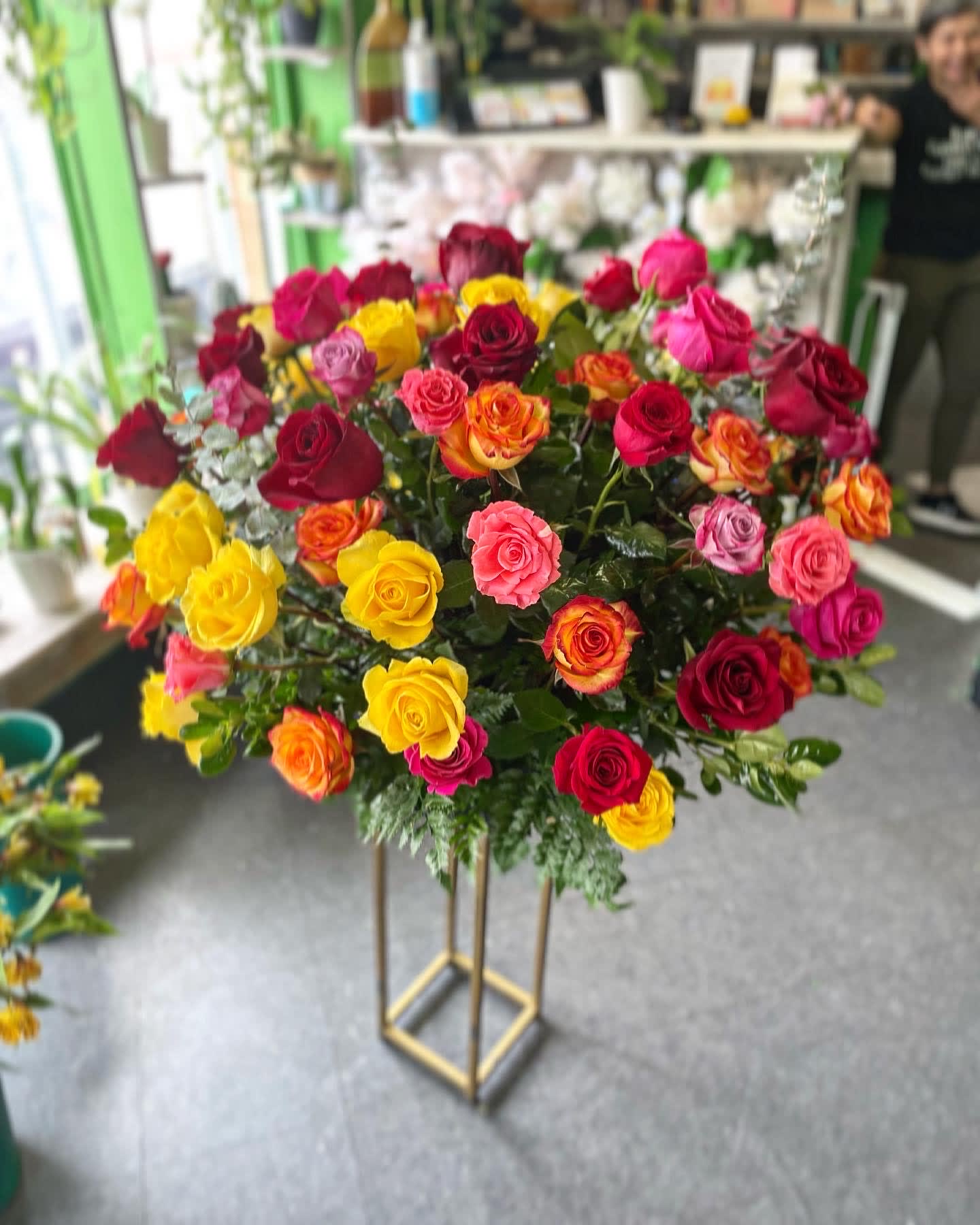 Amor  - This beautiful arrangement has 100 mix roses.