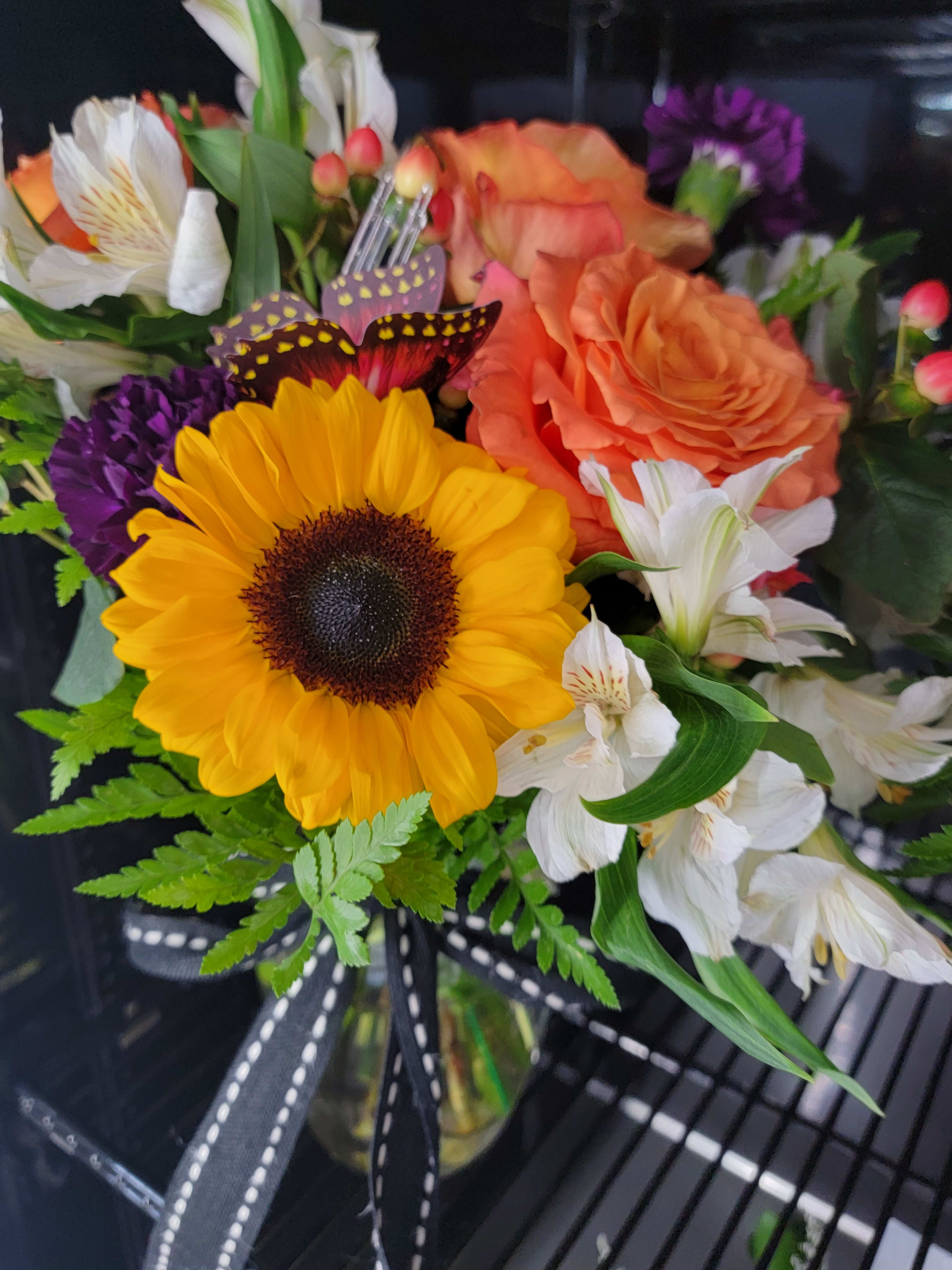Spirited Sunflower - &quot;Spirited Sunflower&quot; is an enchanting bouquet full of texture, color and fragrance.   Carefully designed by our expert florist with special care  for a long-lasting arrangement.  