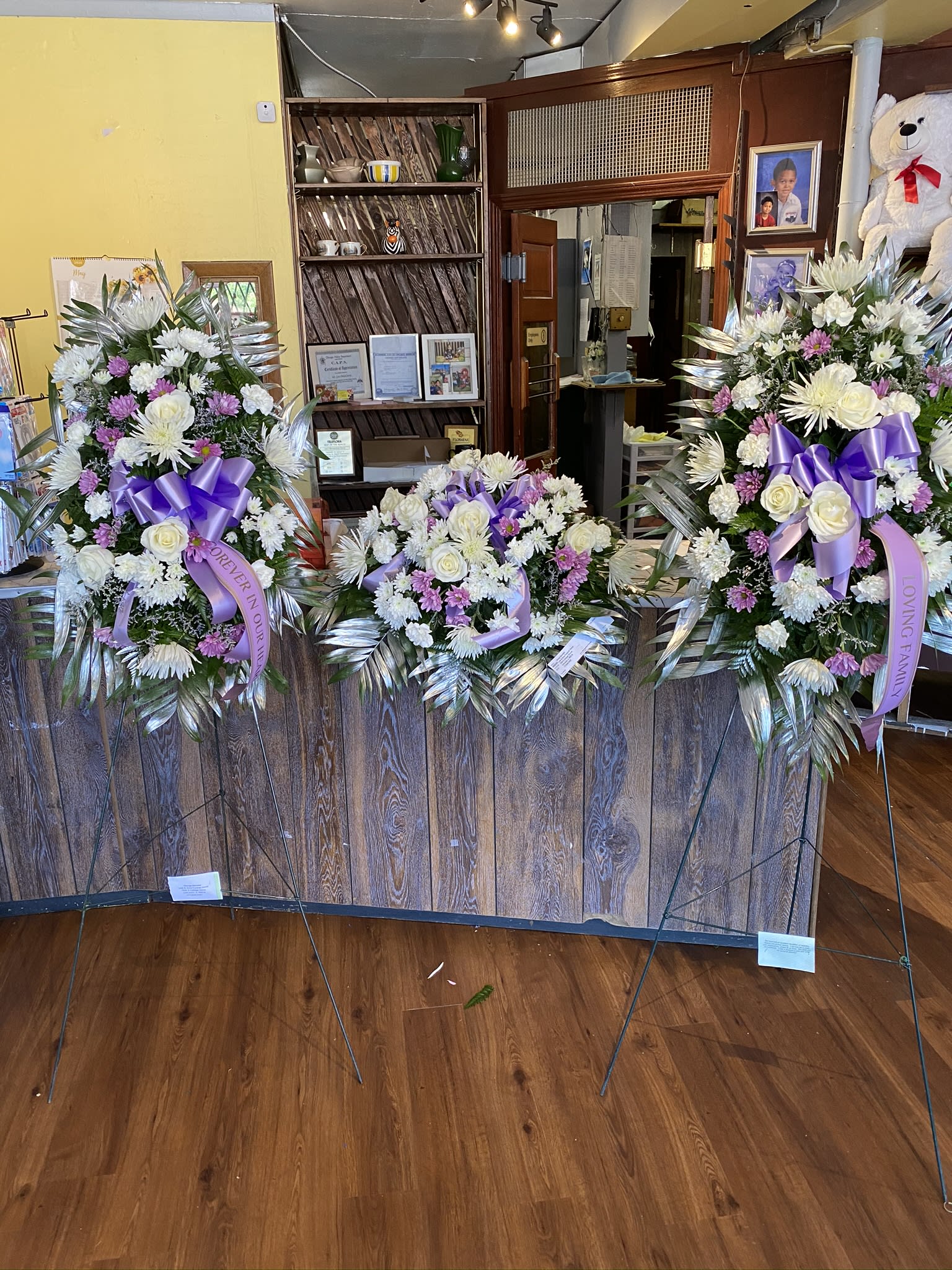 Lavender &amp; White 3 Piece - 3 Piece Special consisting of mixed mums, daisies, roses, and carnations.