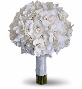 Gardenia and Grace Bouquet - Beloved for their enchanting fragrance, gardenias are gathered with hydrangea and roses into an elegant white bouquet.  Gardenias and hydrangea are paired for a stunning all-white bouquet.  Approximately 10&quot; W x 13 1/2&quot; H  Orientation: N/A