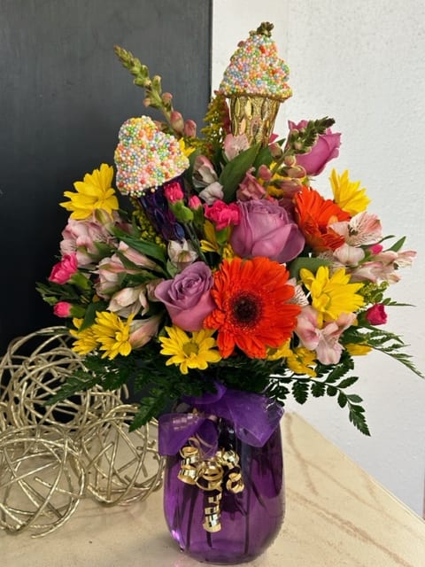 Birthday sprinkles - colorful assortment of flowers in a purple vase with fun ice cream picks fun and colorful for a special birthday!!