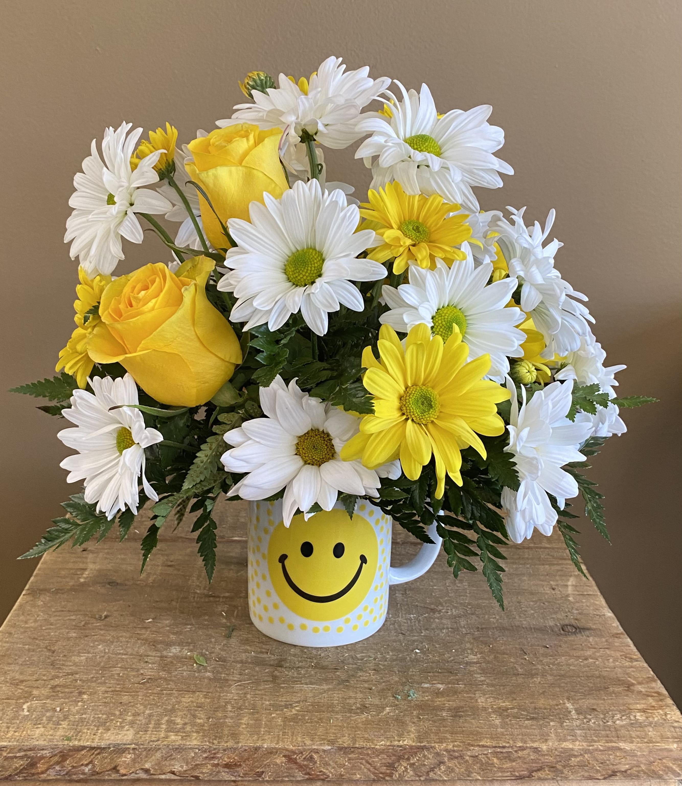 Smiley Mug Bouquet with Roses by Llanes Flower Shop, LLC
