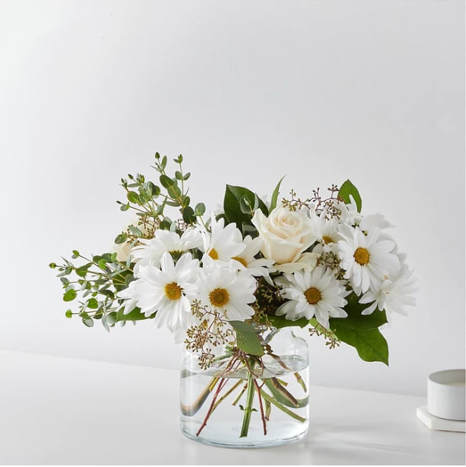 Fresh Linen Bouquet - Let the breeze run through the white roses and eucalyptus for an elegant botanical touch to any interior.  Please Note: The bouquet pictured reflects our original design for this product. While we always try to follow the color palette, we may replace stems to deliver the freshest bouquet possible, and we may sometimes need to use a different vase. DETAILS The Exquisite Bouquet is approximately 19&quot;H x 19&quot;W. Designed by florists, ready to display. For long–lasting blooms, replace the water daily. We suggest trimming the stems every couple days. Pet Safety Precautions: This bouquet or plant may include flowers and foliage that are known to be toxic to pets. To keep them safe, be sure to keep this arrangement out of your pet's reach.