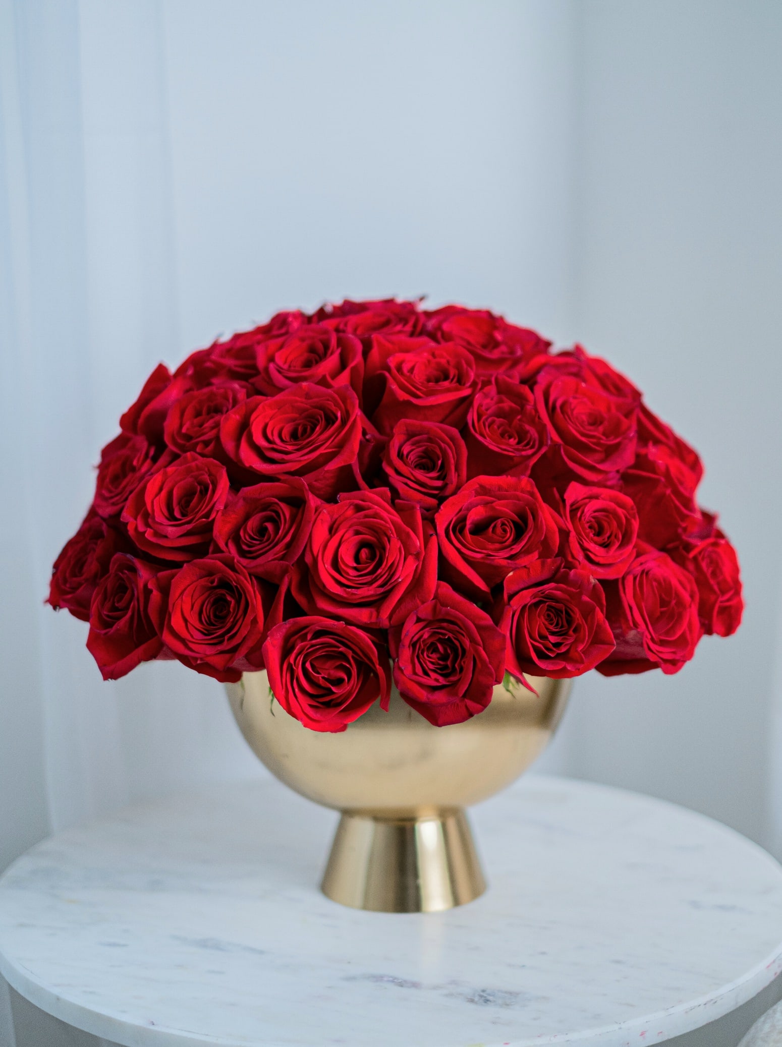 #9 Roses Wedding  - Red roses are recognized queens of the flower world. Passionate and sensual, they will be a wonderful gift for any celebration. A classic bouquet of 50 red roses in a golden vase. It looks elegant and stunning!  