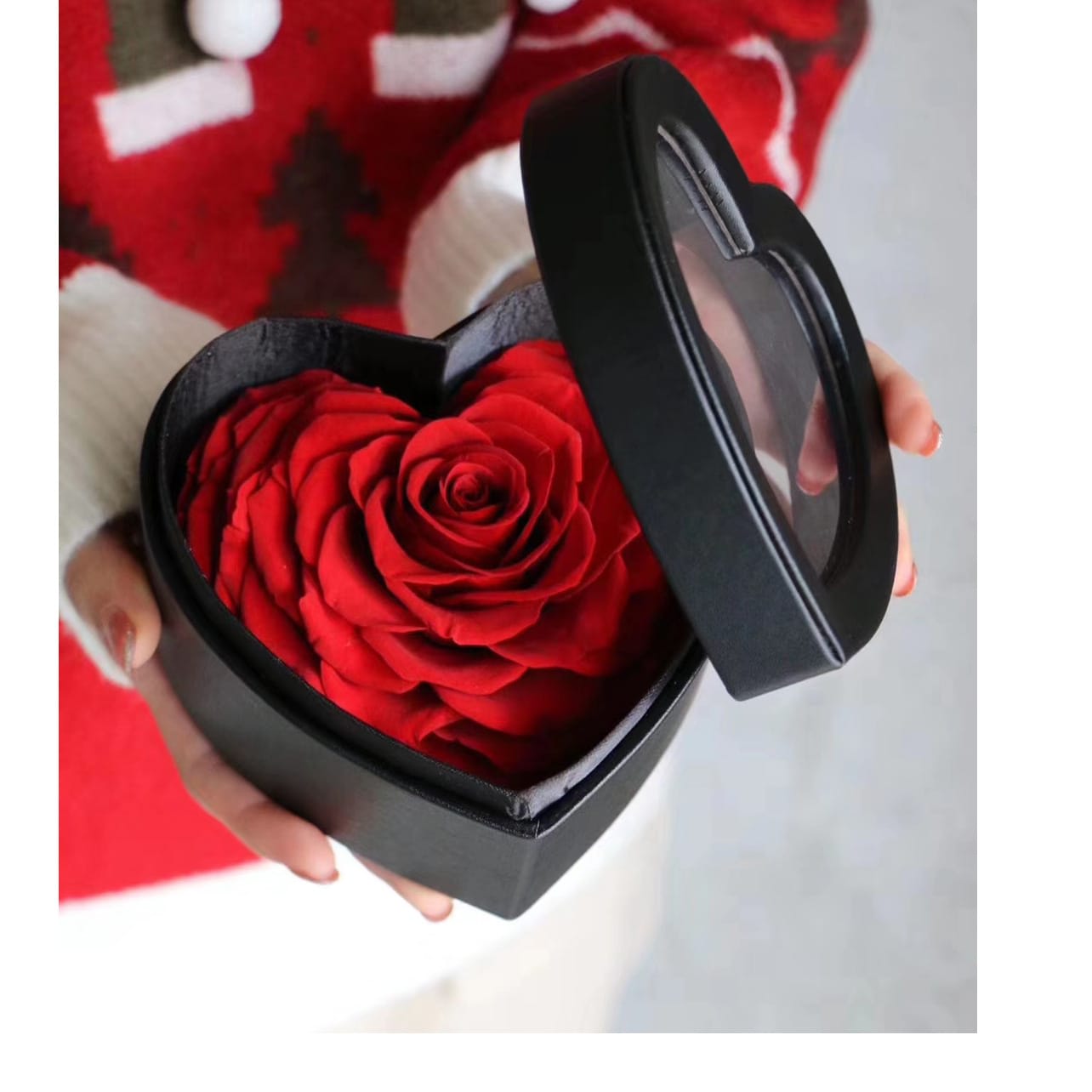 Heart shape Forever Single Red Rose  - This is one of our Small yet Best Luxury Gift Item. Made with real roses which are the highest quality preserved roses from Ecuador. Preserved roses are unique in a way that they remain fresh for approximately 2-3 years. They are fresh roses, carefully picked in their most beautiful state and specially treated with a preserving liquid. These real roses that require no water or sunlight and will not die under regular indoor conditions. These roses are the best option for having a real piece of nature for a very long time.   Comes in a 4&quot; dia Heart Shape Black Box . This Amazing Gift Item has stunning 1 large forever Red Roses inside Heart Shape Box.   This gorgeous arrangement will make anyone instantly see how much you love them. Just the floral display your one and only someone will immediately fall in love with. The ultimate gift for sending extraordinary beauty to brighten the day of the love of your life, from the moment this remarkably arrangement arrives they won't be able to stop themselves from smiling every time they see it.  Send this extraordinary Forever Single Red Rose today.  Limited Stock.