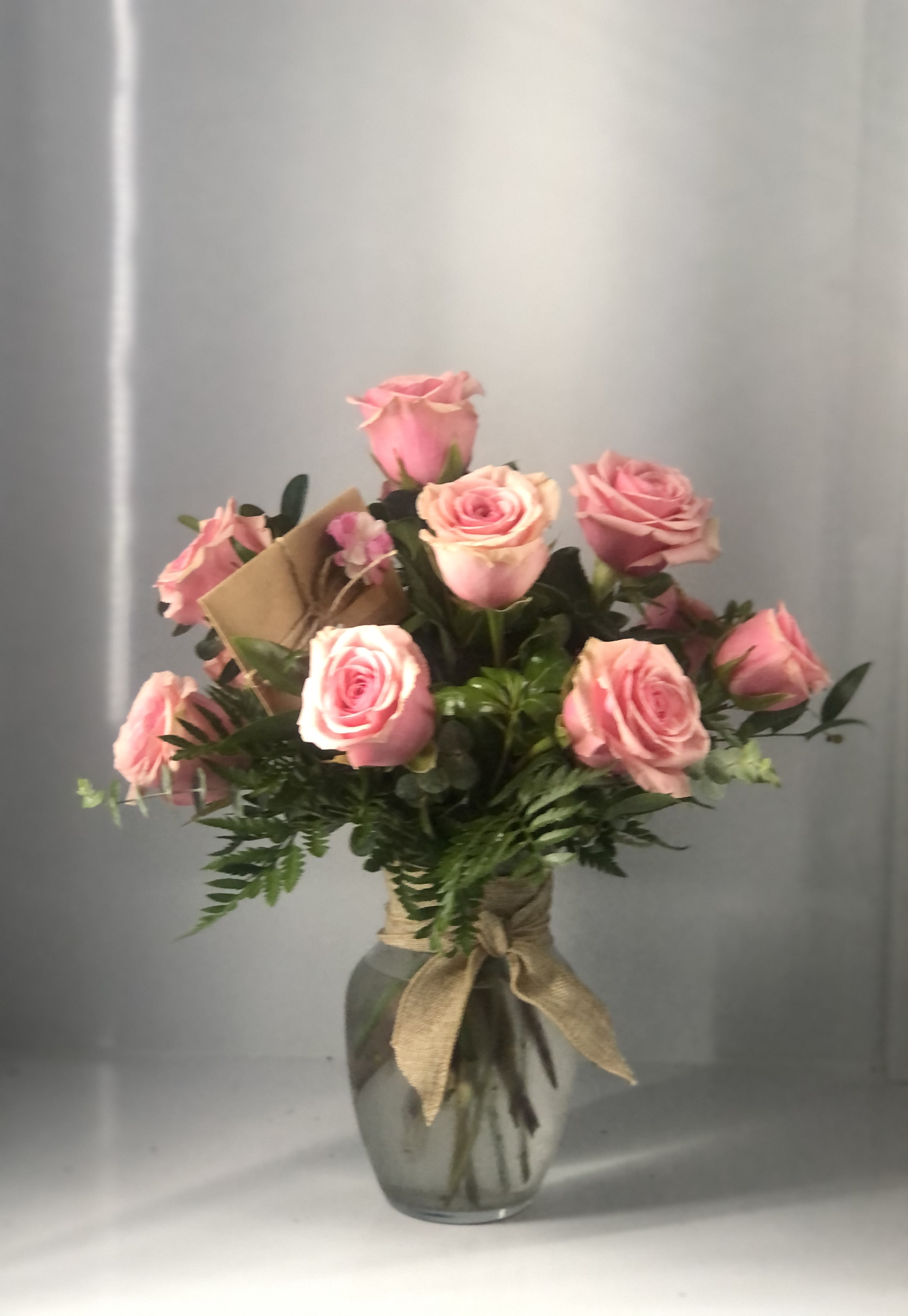  Pink Grace - One dozen roses in a 8&quot;  glass vase.