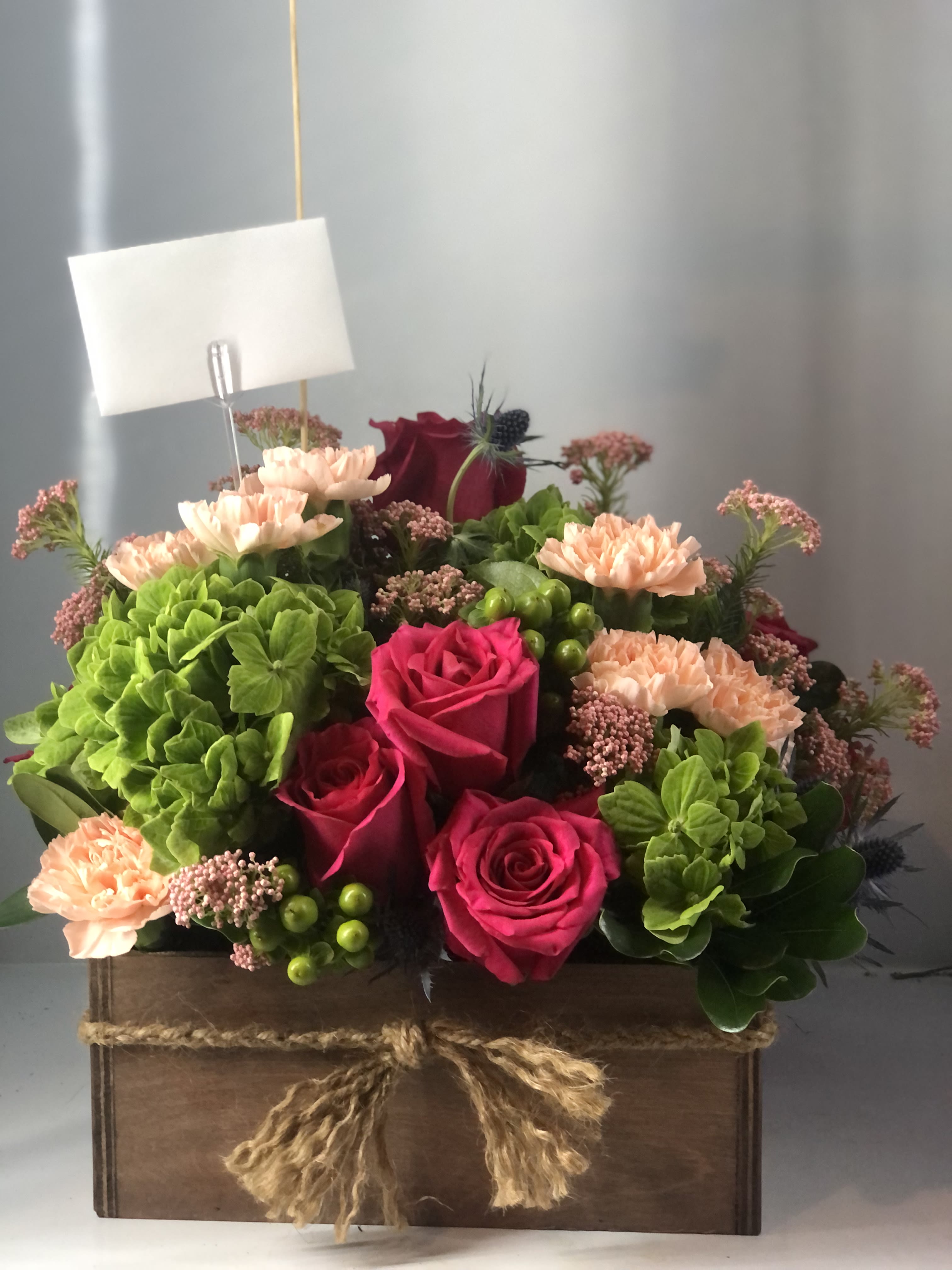 You Live in My Heart - Hydrangeas, hot pink roses , carnations, and beautiful fillers , bring life to this beautiful wooden box