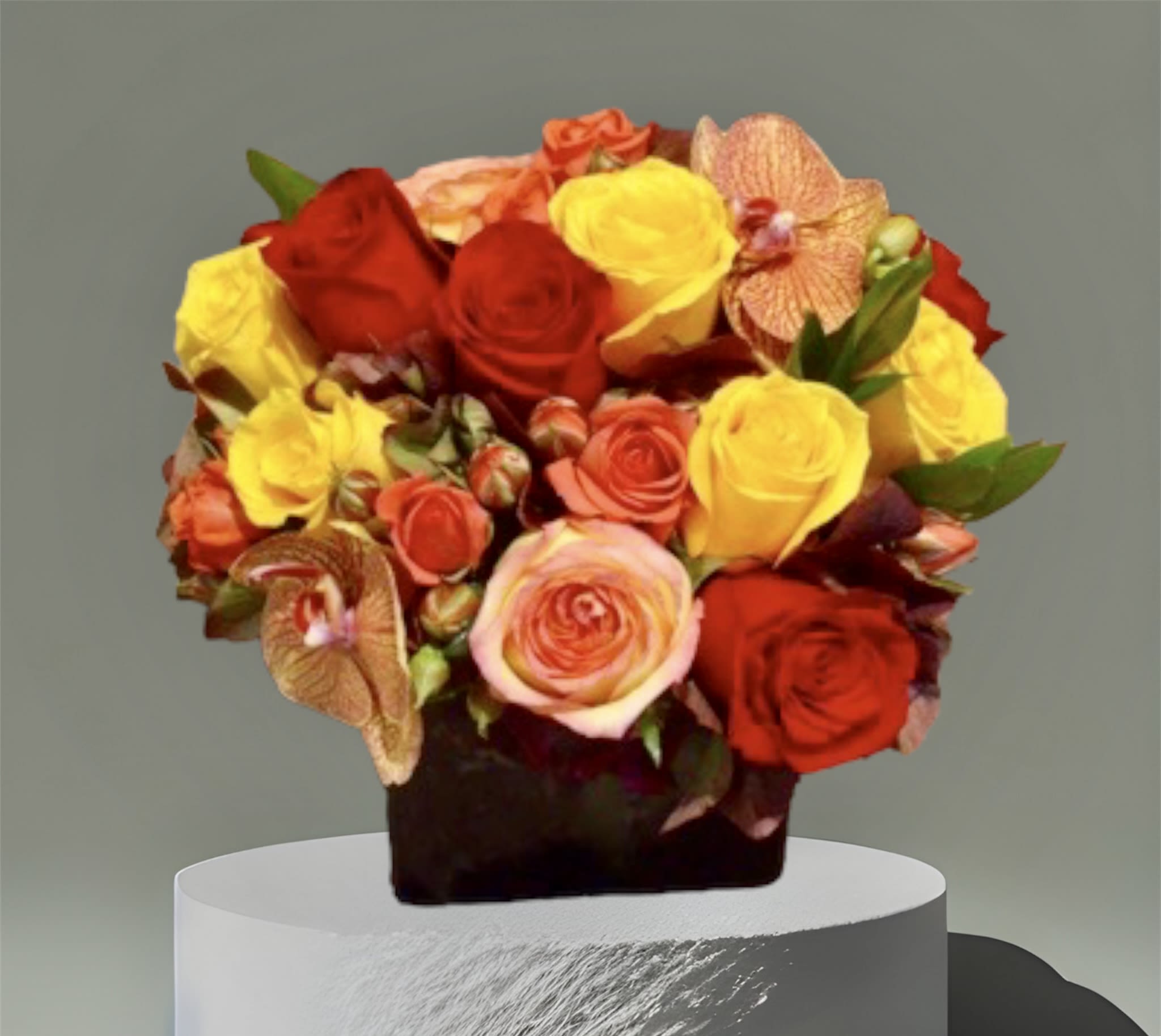 Fall Roses - A colorful Fall mix of roses, hydrangea, and orchids. Arranged in a 5&quot; ceramic square vase. Perfect to celebrate any Fall occasion.