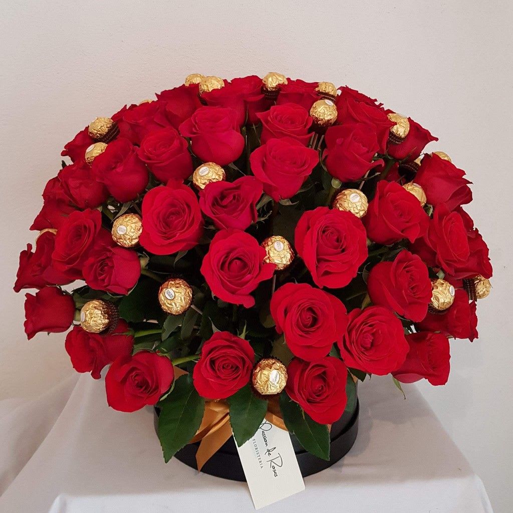 Sweetheart Sweetheart - Box heart shaped. 35 red roses 18 chocolate (Ferrero Rocher) impressive arrangement of red roses with chocolates simply adorable, including a bow.