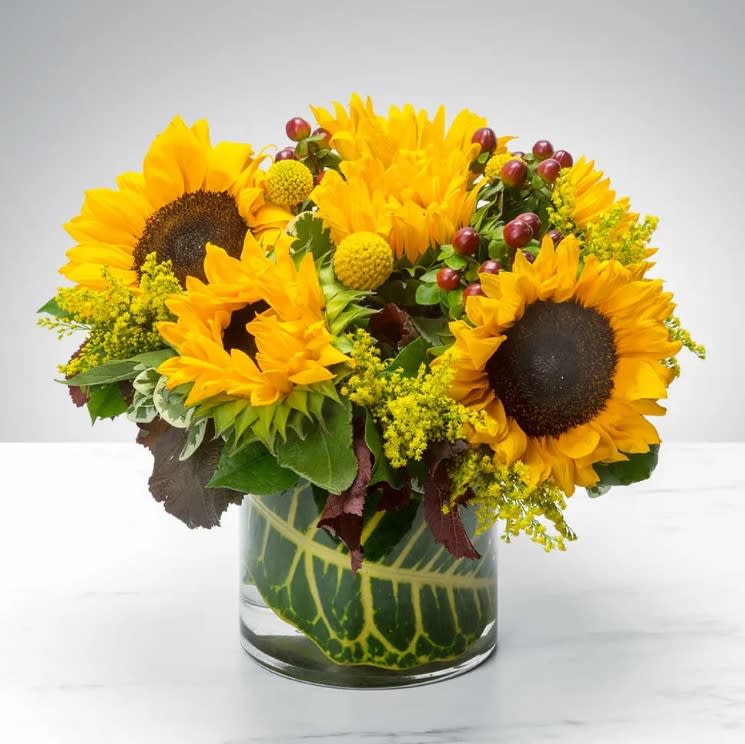 Sunny Sunflowers - A petite bouquet of the happiest flower, sunflowers.  Guaranteed to add some sunshine to your day!
