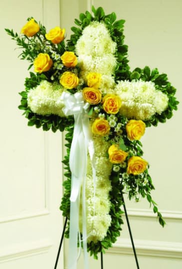 Yellow &amp; White Sympathy Cross - Our Yellow Sympathy Cross is a beautiful tribute to a life of love and faith. Yellow roses accent white mums that are neatly arranged to create the cross. It is a symbolic piece that will exude your most genuine support, faith and condolences. 