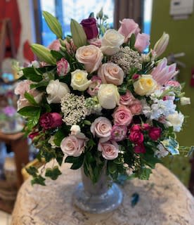 Love Me the Most Love Me the Most - No other rose arrangement can convey LOVE like this one. A gorgeous collection of four stunning colors.....the highest quality and freshest roses available.....this is the piece de resistance!