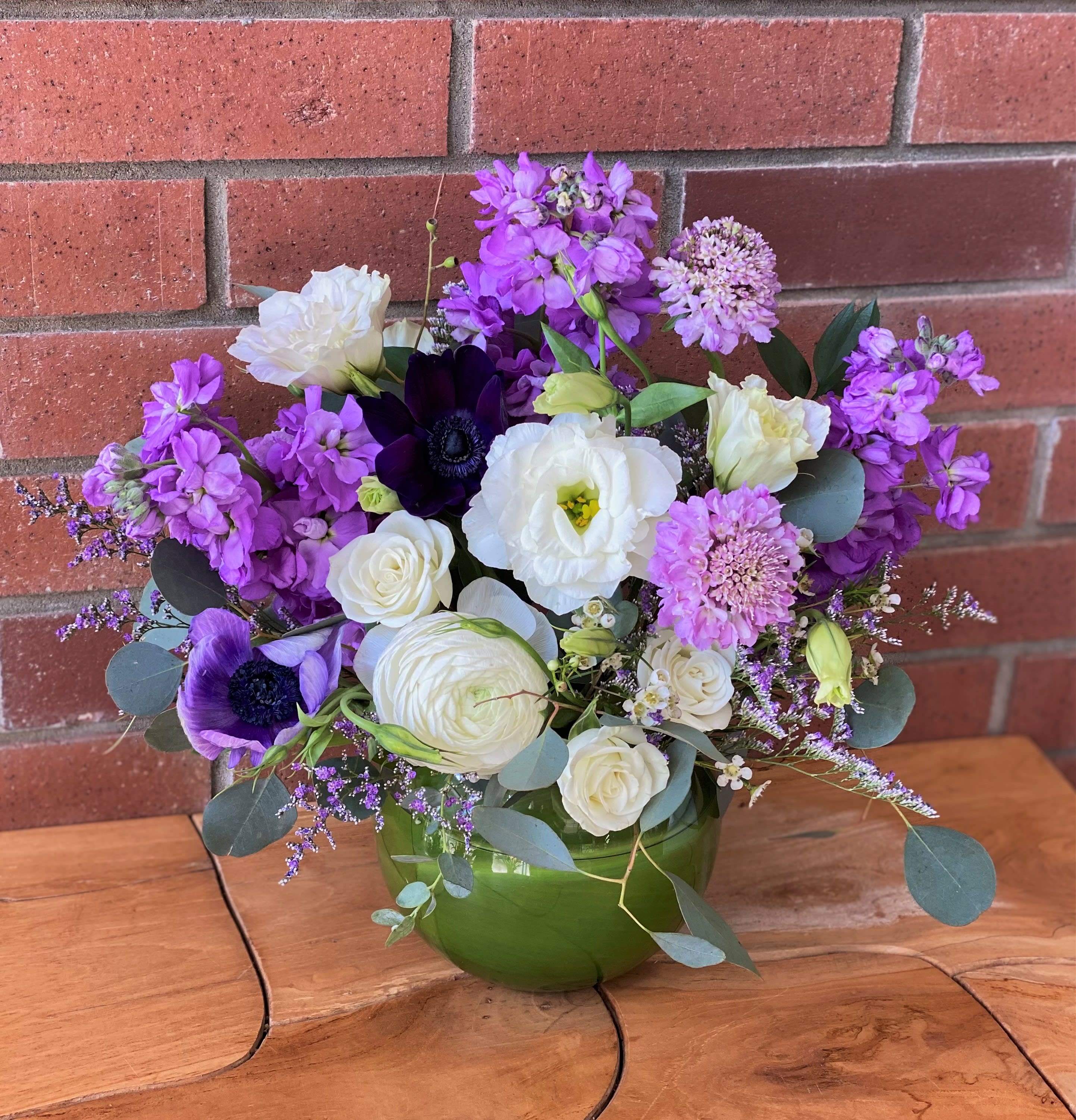 Purple flower arrangement deals