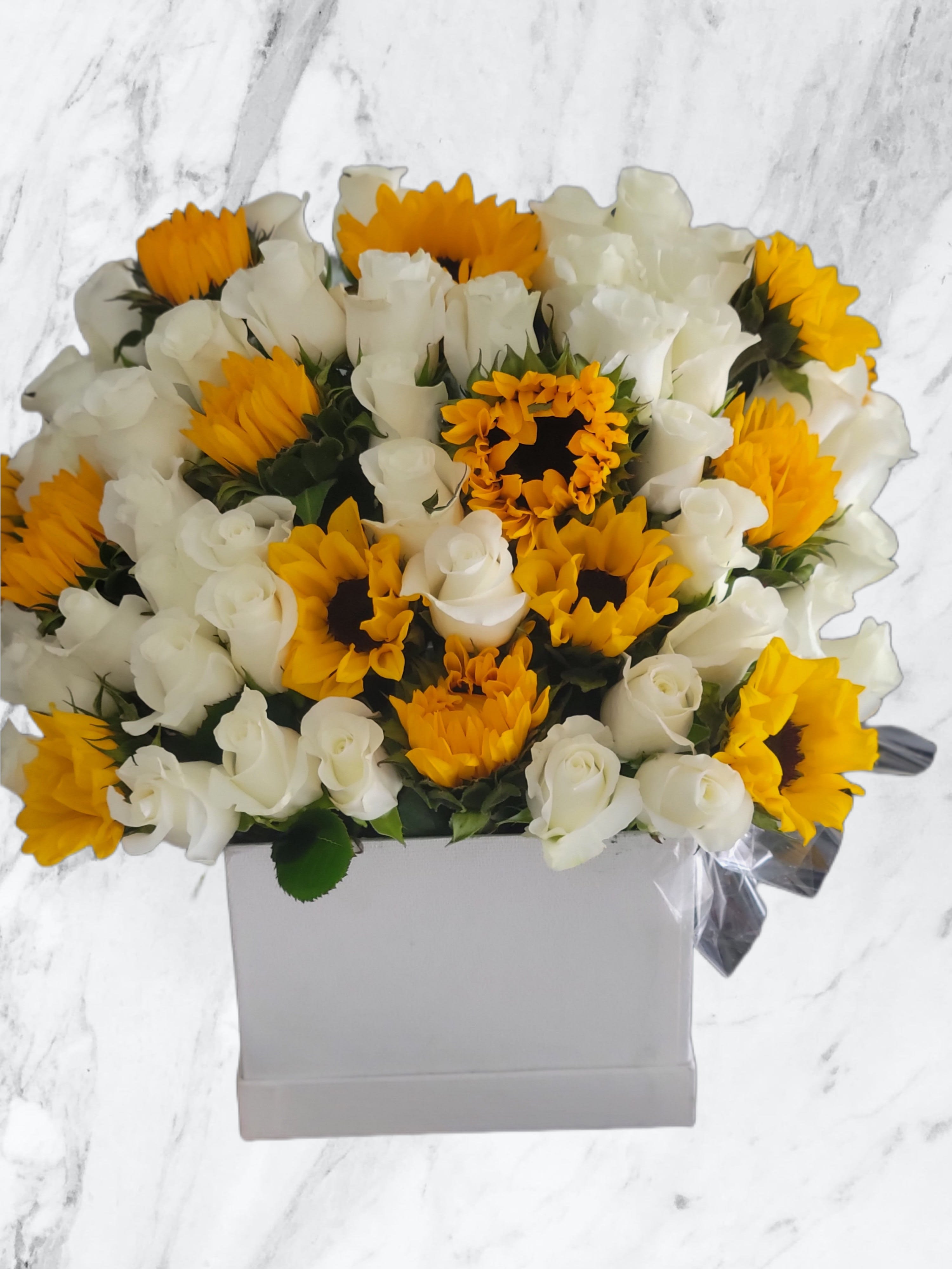 Roses and Sunflowers Flower Box Roses and Sunflowers Flower Box - White roses and sunflowers in a flower box. Different color roses available