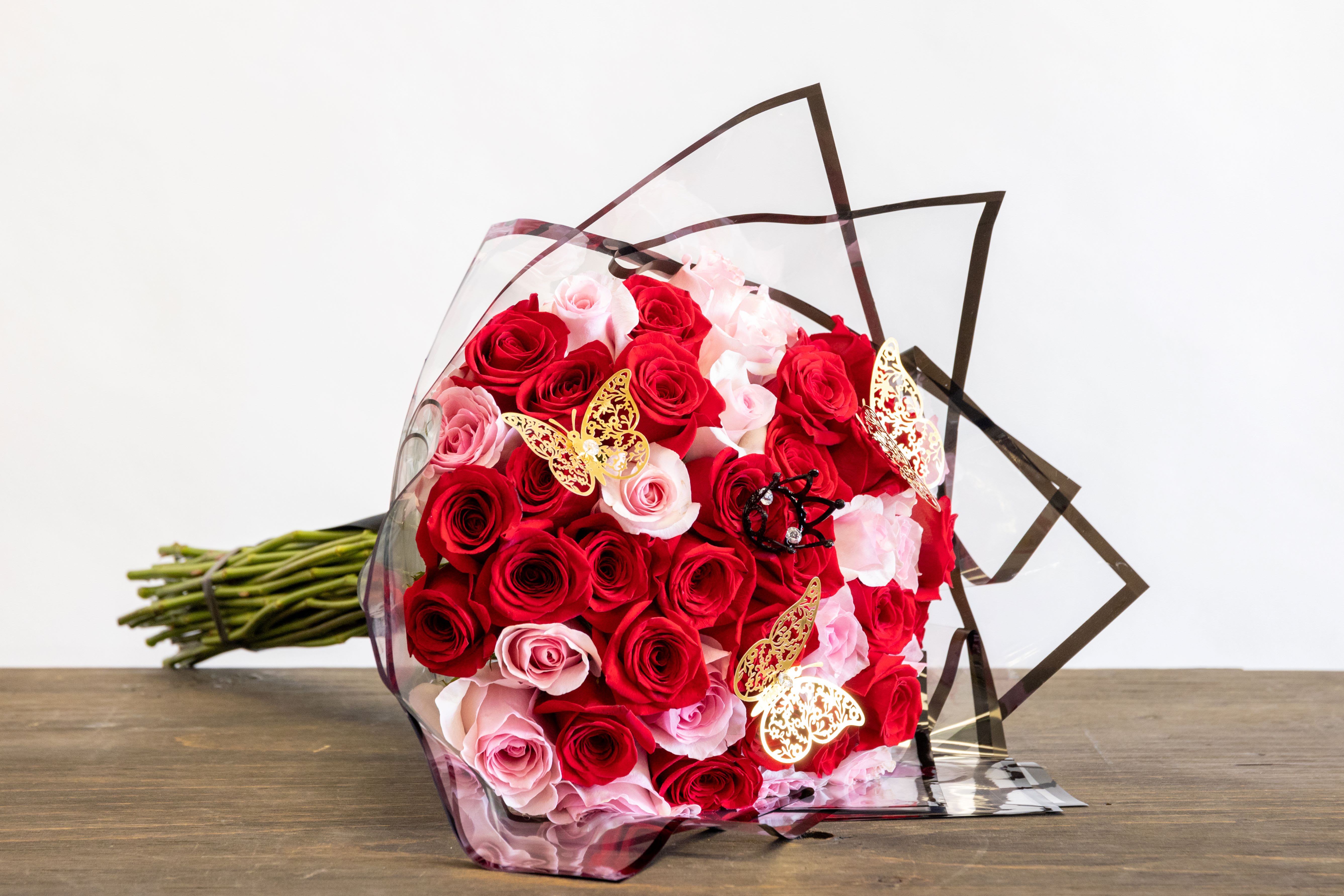 Pink and Red Pink and Red - Three dozen pink and red roses in the buchon style