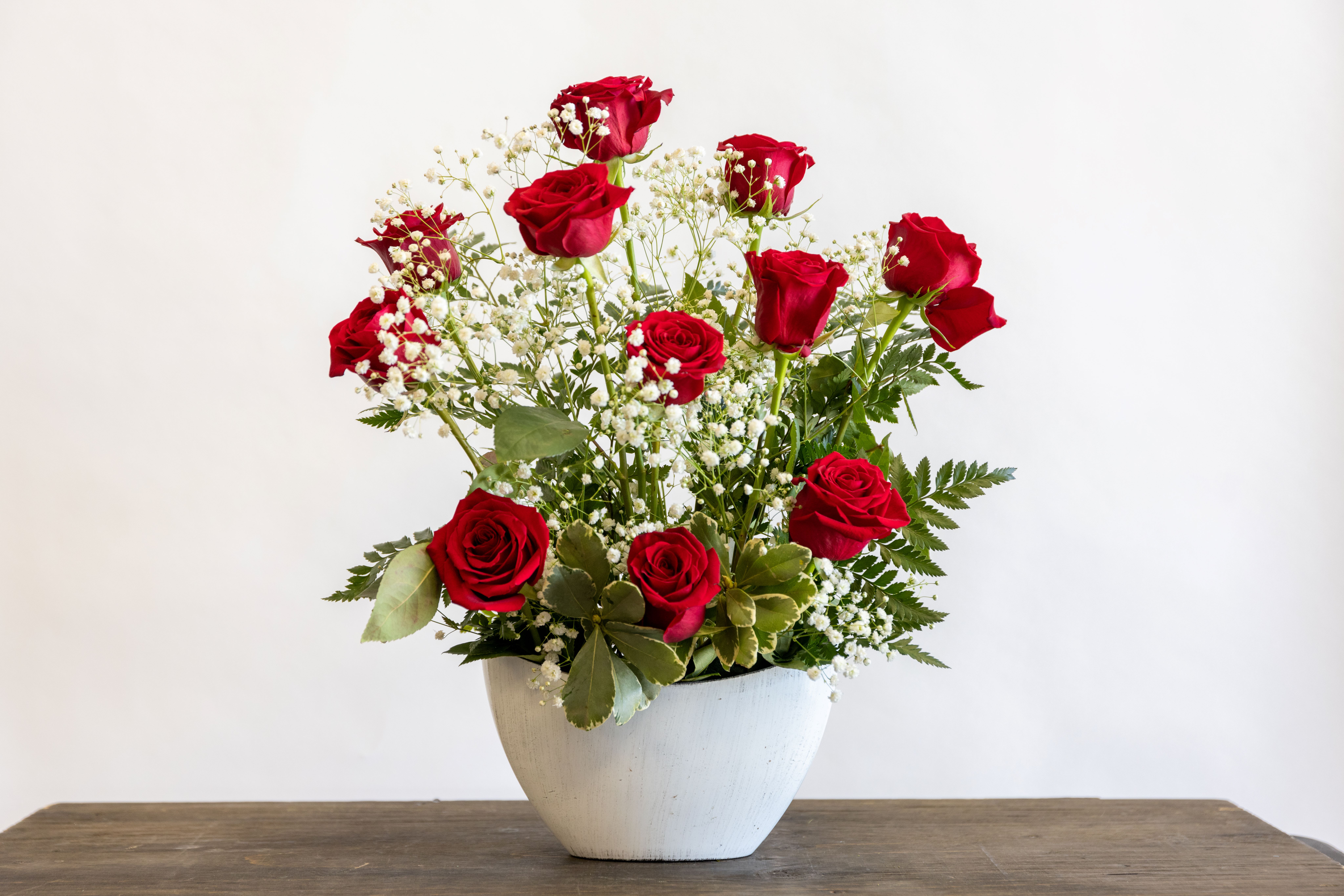 Table Set  - Roses and fauna set up in an elegant manner perfect for a table