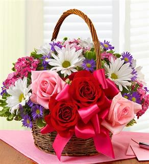 Basket of Love - Product ID: 90933  Express youerself perfectly with this vibrant, hand-designed arrangement in a handled wood basket. Overflowing with fresh roses, dianthus, mums and more, it's wrapped and ready with a stylish satin ribbon. Floral and basket may vary due to local availability. Basket measures 9.5&quot;L. Large arrangement approx. 13&quot;H x 15&quot;L. Medium approx. 12&quot;H x 14&quot;L (Shown). Small 11&quot;H x 14&quot;L .