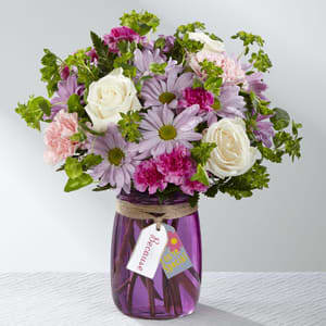 The FTD® Because You're Special Bouquet - They will be tickled pink when your special recipient receives this blushing and brilliant inspirational fresh flower bouquet! That perfect blend of pink and purple, this flower arrangement brings together lavender traditional daisies, pale pink carnations, and lavender mini carnations, popping with elegant white roses and accented with lush greens. Presented in a purple glass vase tied with special tags that read, &quot;Because You're Special,&quot; around the neck, this flower bouquet is ready to create a treasured thank you, thinking of you, or happy birthday gift. GOOD bouquet is approx. 11&quot;H x 10&quot;W. BETTER bouquet is approx. 12&quot;H x 11&quot;W. BEST bouquet is approx. 14&quot;H x 13&quot;W.