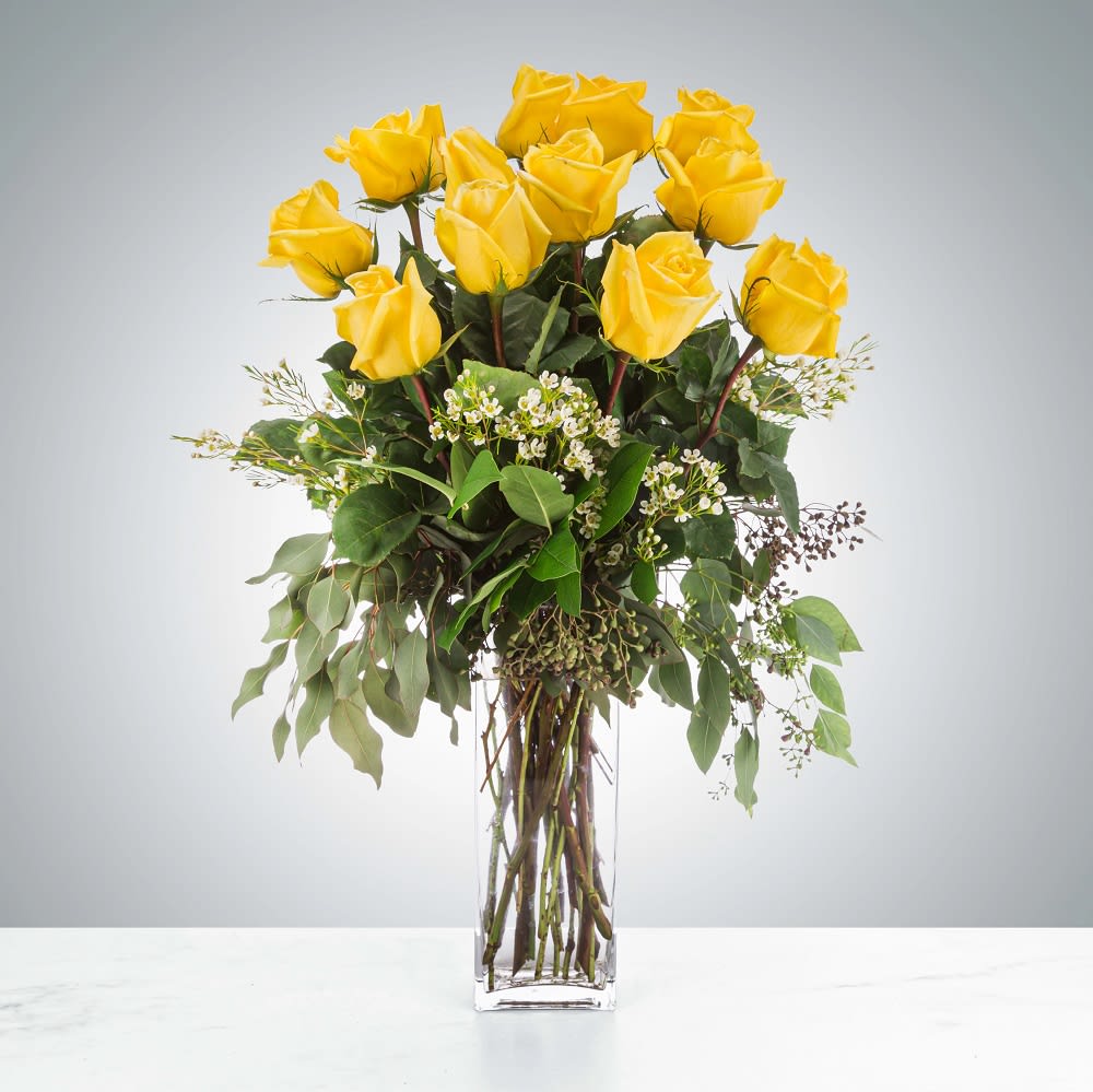 Felicitations by BloomNation™ - Yellow roses are a great option to send someone for any occasion. Send beautiful yellow roses to your friend, co-worker, or family member to brighten up their space and celebrate them! Yellow roses are a good gift for graduations, birthdays, or celebrating an accomplishment like a new job.  DETAILS  FLORIST-TO-DOOR  Orientation: One-Sided  BLOOM DETAILS Roses Seasonal Filler Greenery  The Standard Arrangement is approximately 18&quot; W x 25&quot; H. (SHOWN 12 Roses) The Deluxe Arrangement is approximately 18.5&quot; W x 25&quot; H. (18 Roses) The Premium Arrangement is approximately 19&quot; W x 25&quot; H. (24 Roses)  Designed by our award-winning florist designers.  HOW TO CARE FOR YOUR FLOWERS 1. Keep in a location without direct sunlight and away from extreme heat or cold. 2. Replace the water regularly, and mix in the flower food packet provided 3. Trim the stems every other day 4. As flowers/foliage wilt, remove &amp; discard  Please Note: The arrangement pictured reflects an original design for this product. While we always do our best to follow the original flower recipe, the exact flower or container is sometimes unavailable. We may replace items of equal or greater value to deliver the freshest flowers possible while keeping the style &amp; color palette. We assure you that we will create a beautiful, fresh flower arrangement with only the best quality flowers to keep you as a loyal customer.  How to place an order? We have several options. 1. You can place an order directly on this secure website. 2. You can call in your order by dialing: (323) 262 - 9238 3. You can visit our store (appointment recommended 323.262.9238)  NINFA'S FLOWERS 2405 WHITTIER BLVD. LOS ANGELES, CA. 90023  ATTENTION: *Please note that on busy holidays, Valentine's Day, and Mother's Day, we cannot verify if the recipient received the flowers until the following day because our drivers don't turn in their signature delivery tablets until the following day. You can verify delivery on the website after 10:00 pm or you can call 323.262.9238 the following day after 10:00 am. Thank you for your patience and understanding.