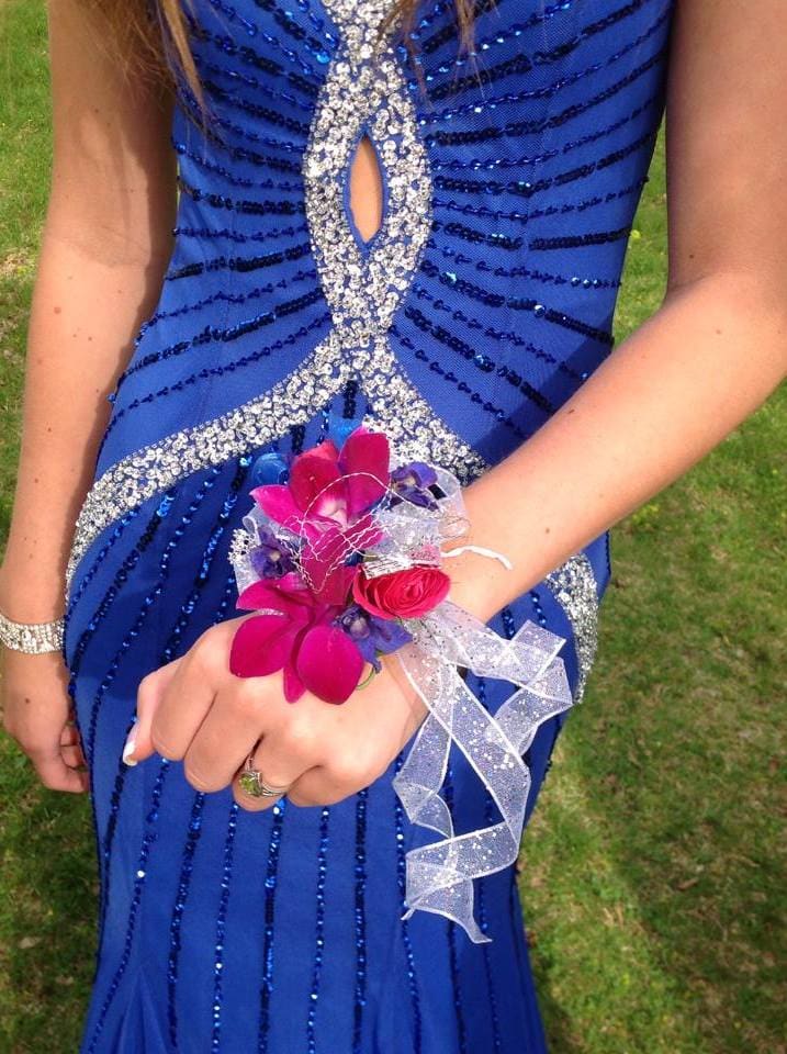 Plum Orchid Corsage Plum Orchid Corsage - Plum colored Orchids with Blue delphinium