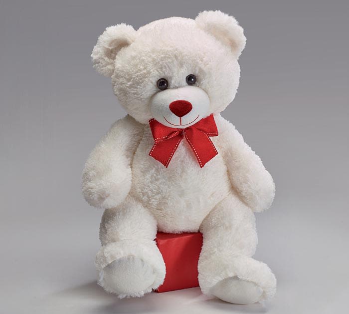 White Plush Bear - White plush bear with red nose and red grosgrain ribbon. Includes easy tie ribbon loop.  Measures 15&quot; high sitting 