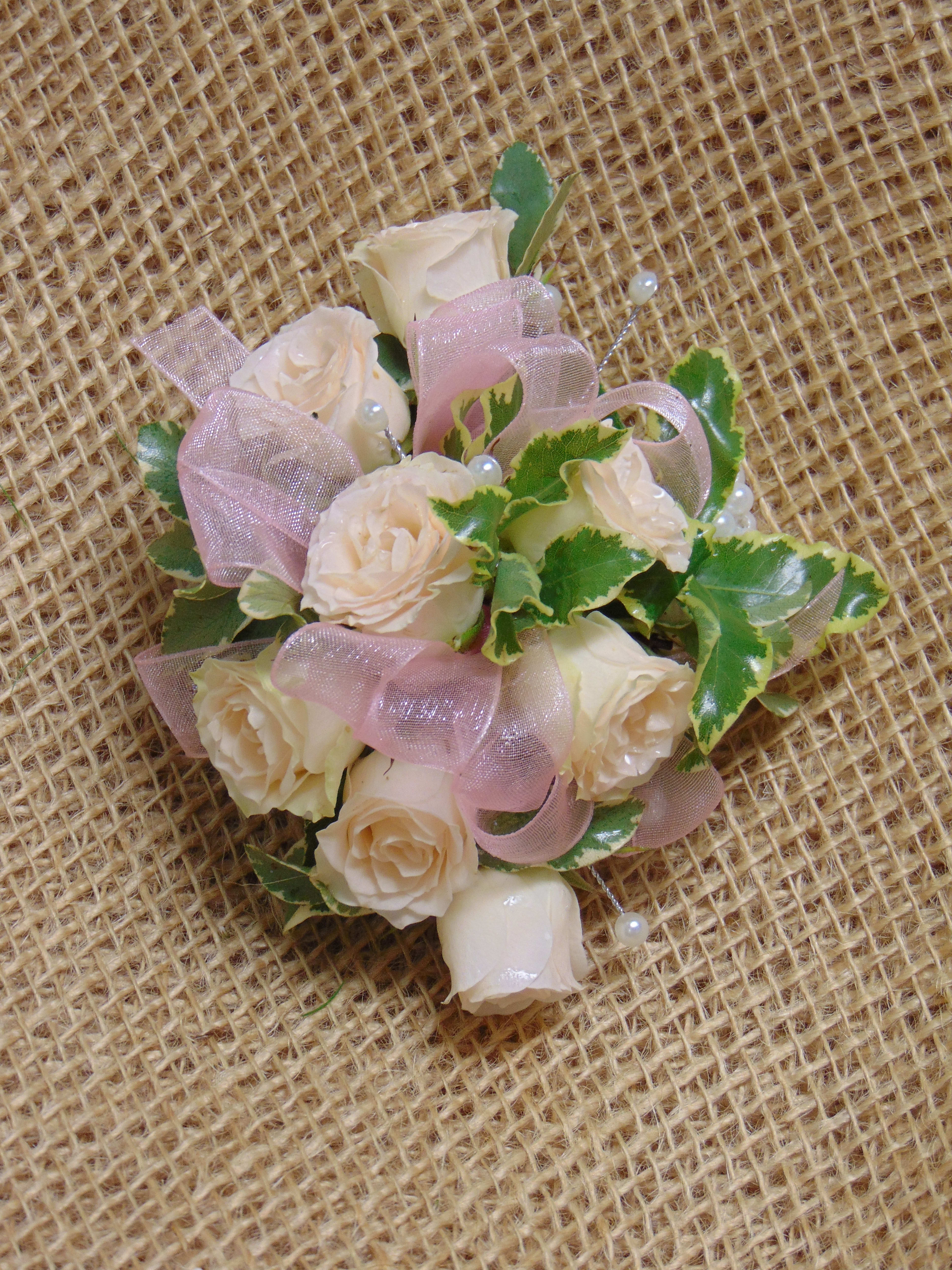 Pink rose wrist outlet corsage