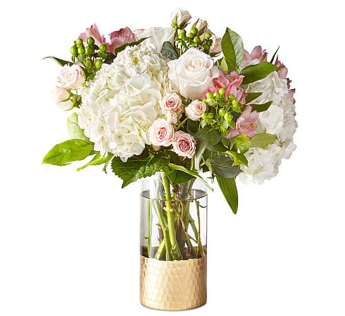 Rosé All Day Bouquet Rosé All Day Bouquet - Give the gift of freshness with a vase full of Rosé All Day. This blush beauty brings elegant excitement to end tables and entryways alike with its selection of roses, hydrangea, spray roses, and more.