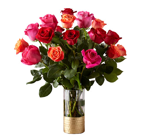 Ever After Rose Bouquet - Live happily with the Ever After Rose Bouquet. Celebrating Valentine's Day's favorite flower, this arrangement features three vibrant hues: orange, hot pink, and red. This trifecta will warm any space they're displayed in and any recipient’s heart.