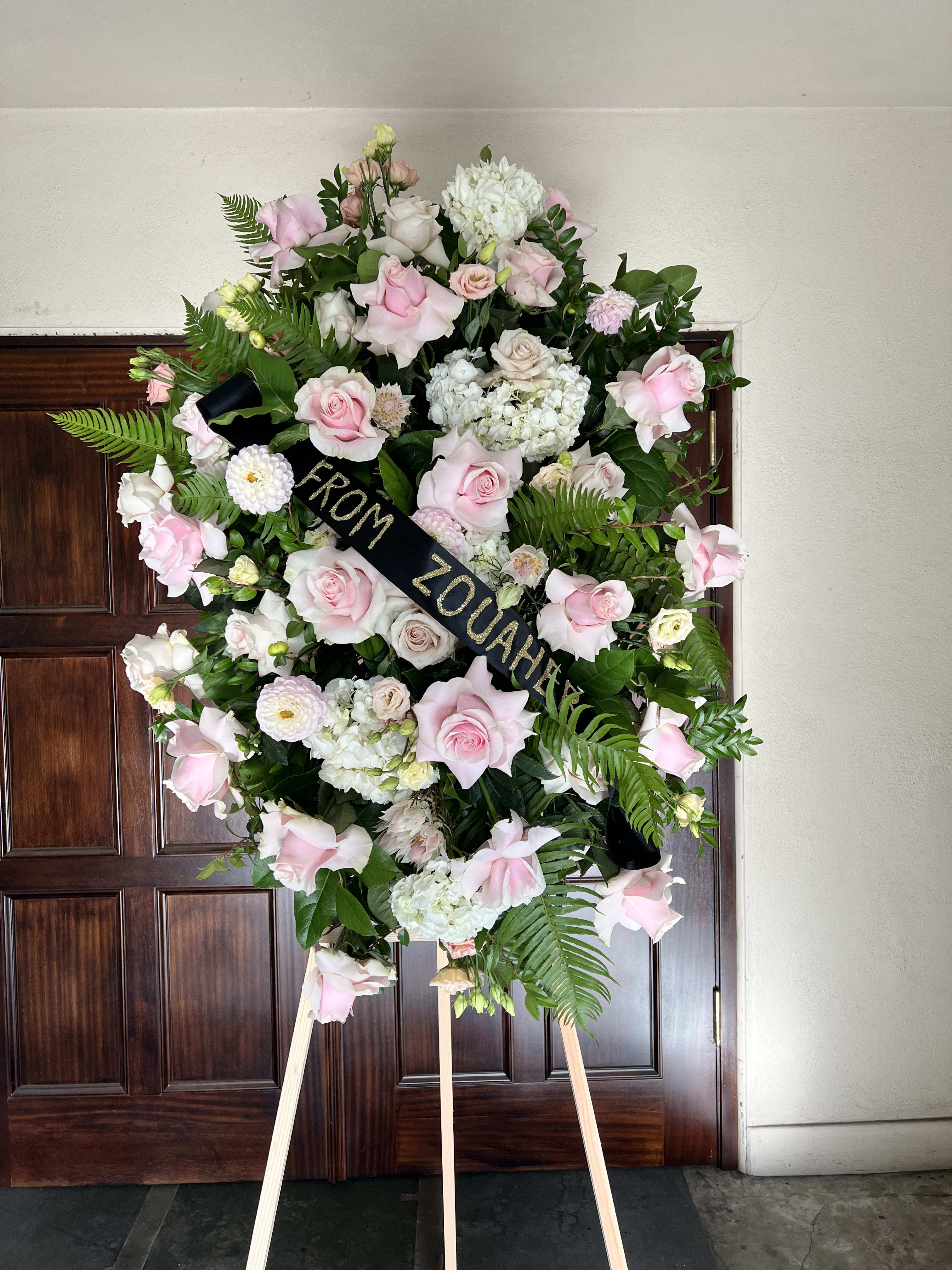 Pink tribute spray - Lovely arrangement of roses, hydrangeas, dahlias and lisianthus