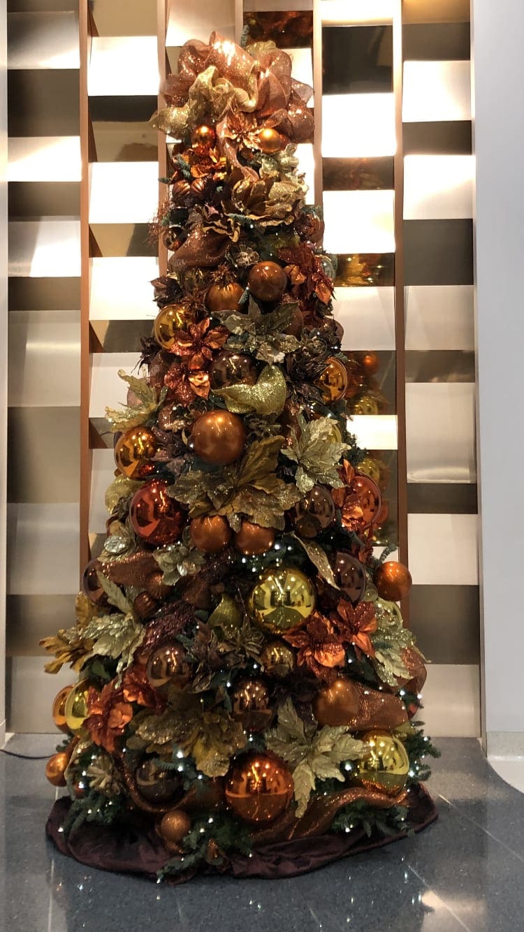 CT9 - 10' artificial Xmas tree provided by customer we decor only with highest quality gold &amp; copper touch burgundy very elegant combo of colors very appropriate for the building decor  (price is for rental only please call for Quote) 