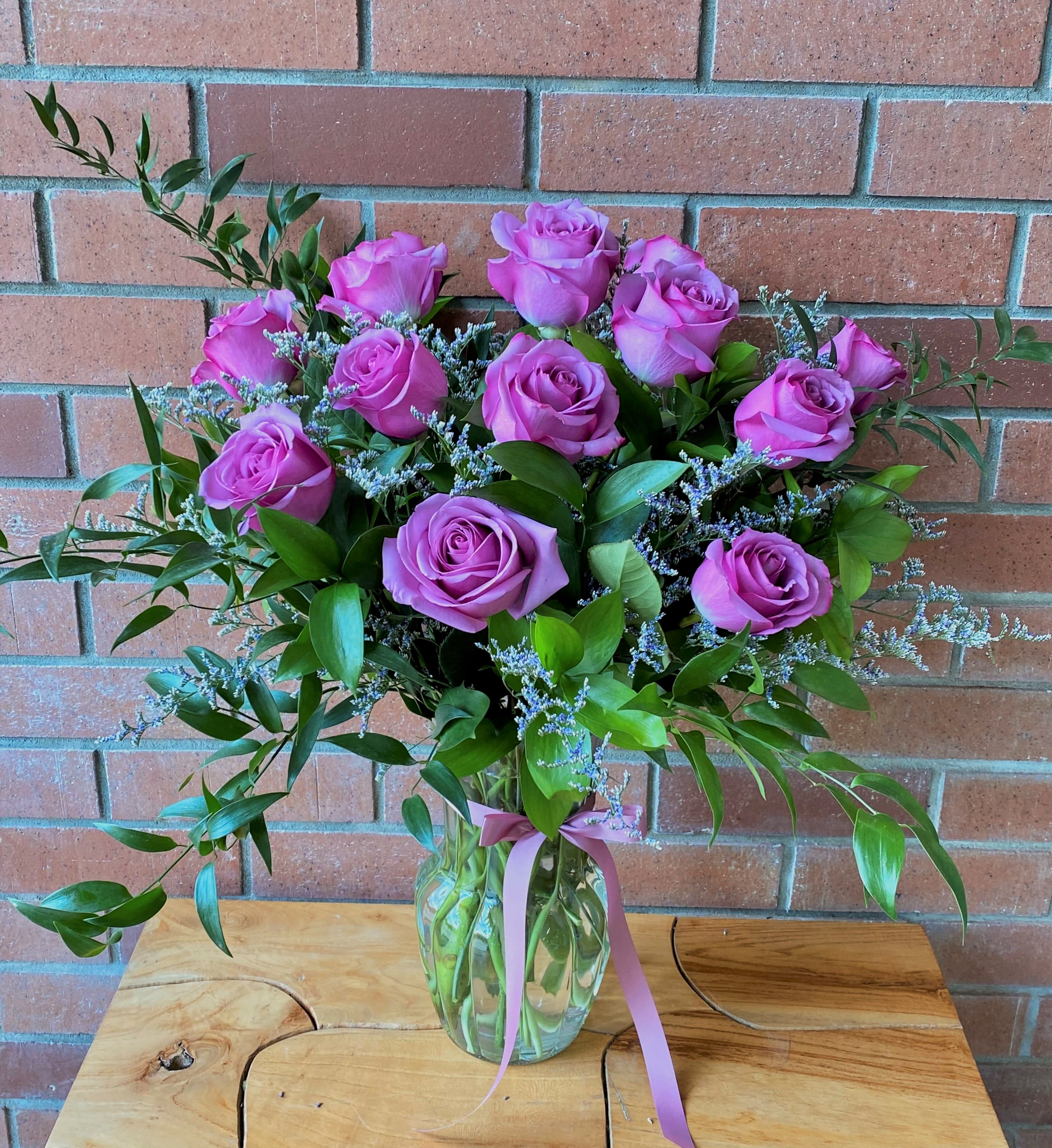 Lavender Rose Special of the Month - One Dozen pastel lavender roses arranged with premium greens and  fillers. Standart - Dozen  Deluxe - Dozen &amp; A Half  Premium - Two Dozen 