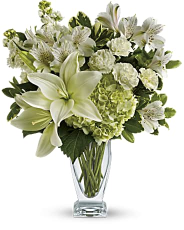 Purest Love Bouquet - Who's the fairest of them all? This snow-white bouquet. A stunning statement of your purest love, this mix of hydrangea and lilies in a Couture vase will take their heart away. This snow-white bouquet includes hydrangea, asiatic lilies, alstroemeria, miniature carnations, stock and fresh green pittosporum. Delivered in a Couture vase. 