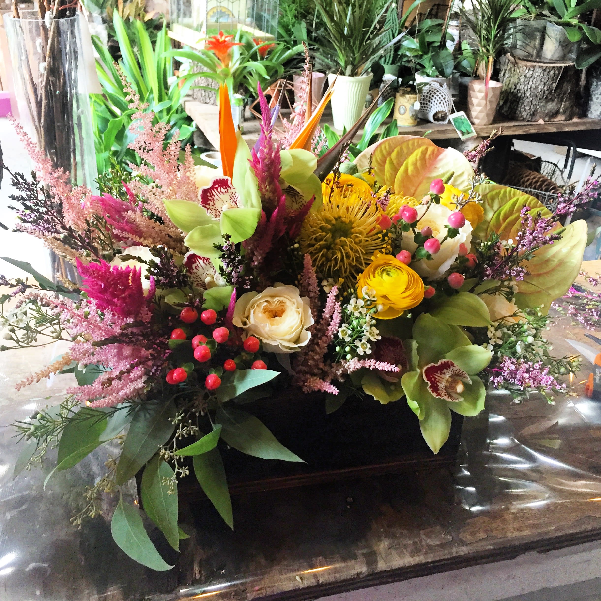 Fabulous Farmhouse - This quintessential farmhouse floral is full of fresh from the field premium flowers arranged in a rustic, romantic, naturally timeless style. This arrangement is housed in a custom BV handmade distressed reclaimed barnwood vessel. 