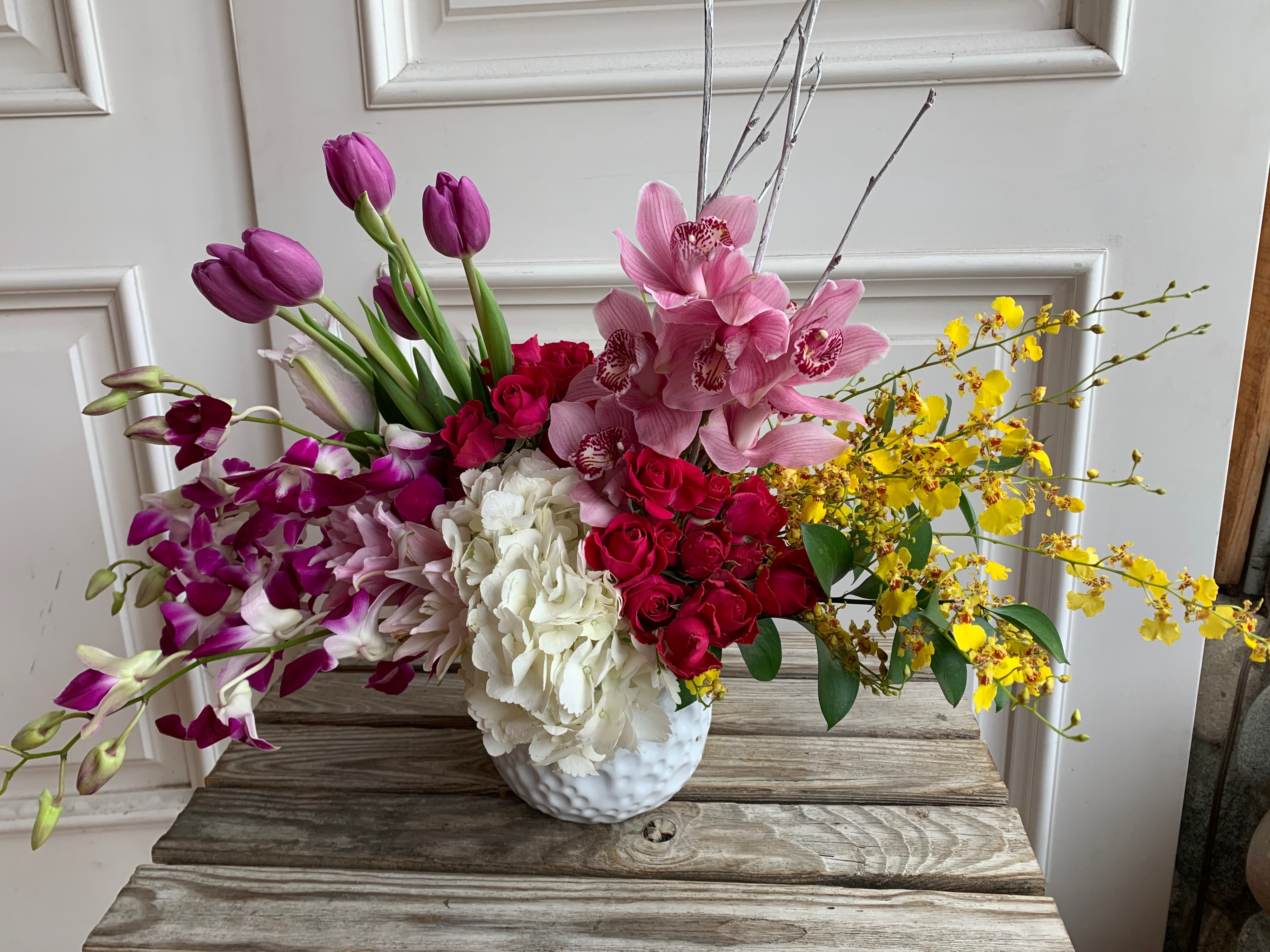 Loving Lady  - Dazzle her with this beautiful arrangement of Spring Blooms  