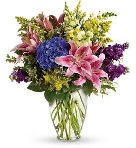 Love Everlasting Bouquet Love Everlasting Bouquet - Put your words of caring into flowers with this beautiful array of pink lilies, blue hydrangea and other floral favorites in a sparkling Ming urn.