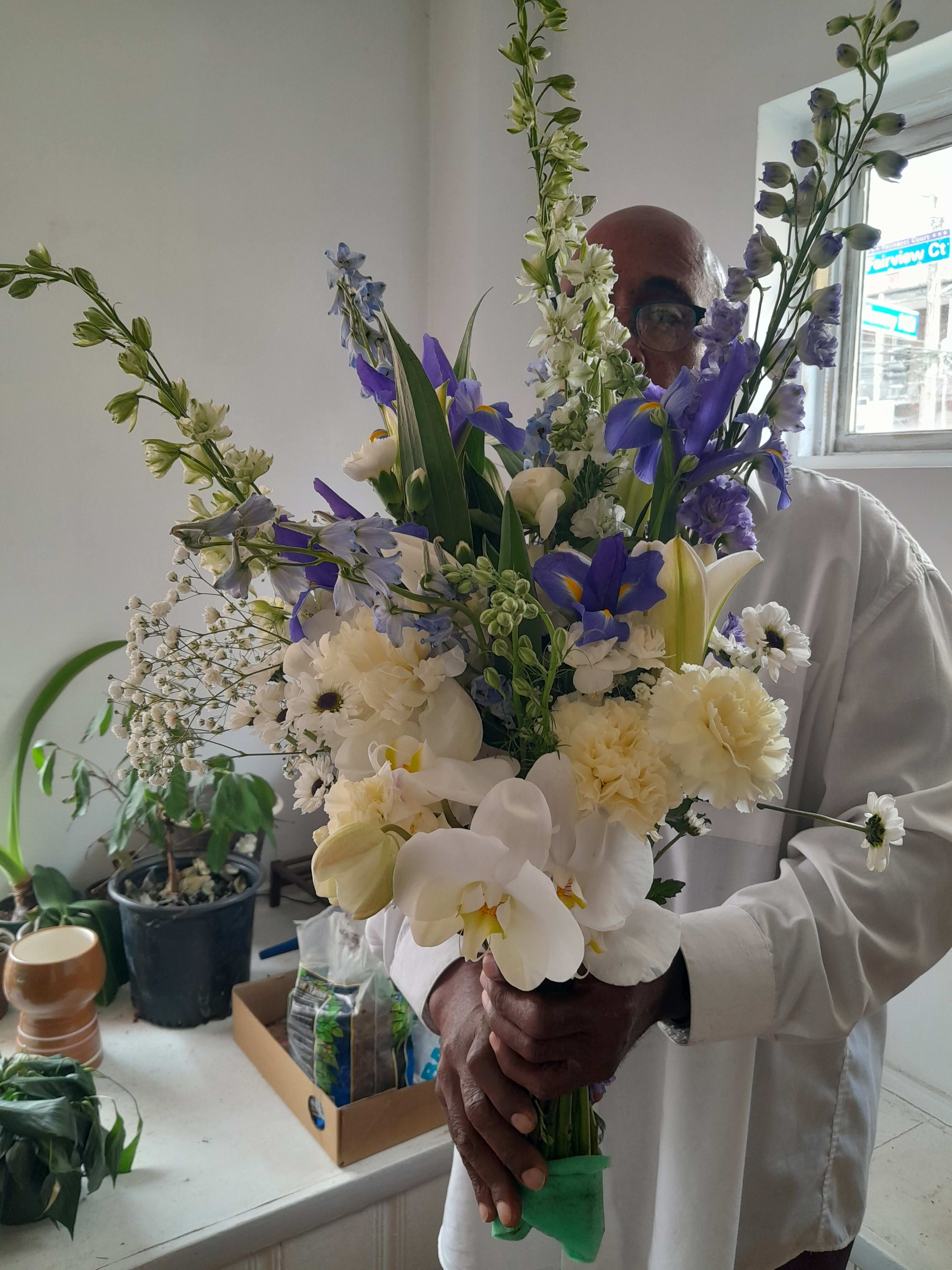 Nautica #2  - Beautiful white and blue hand tied bouquet for any occasion and graduation
