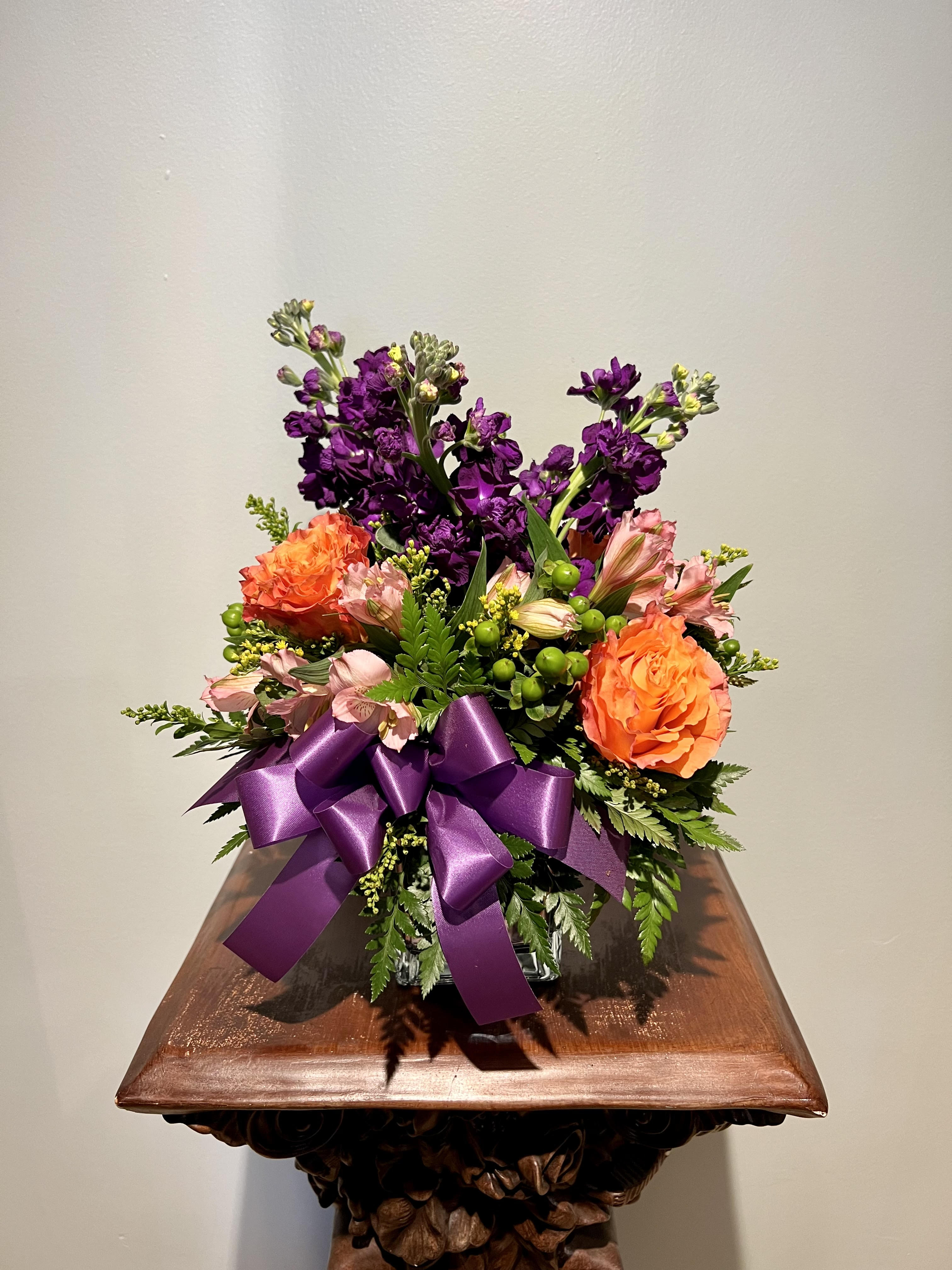 Thinking of You Thinking of You - Placed in a cube, this is a great arrangement for a desk top or a coffee table. Product may differ then pictured depending on availability. Over all them and colors will be honored.
