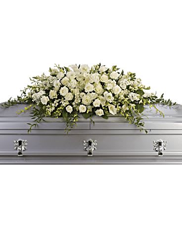 White Casket Sympathy Flowers - A elegant mixture of flowers as shown in white for the casket