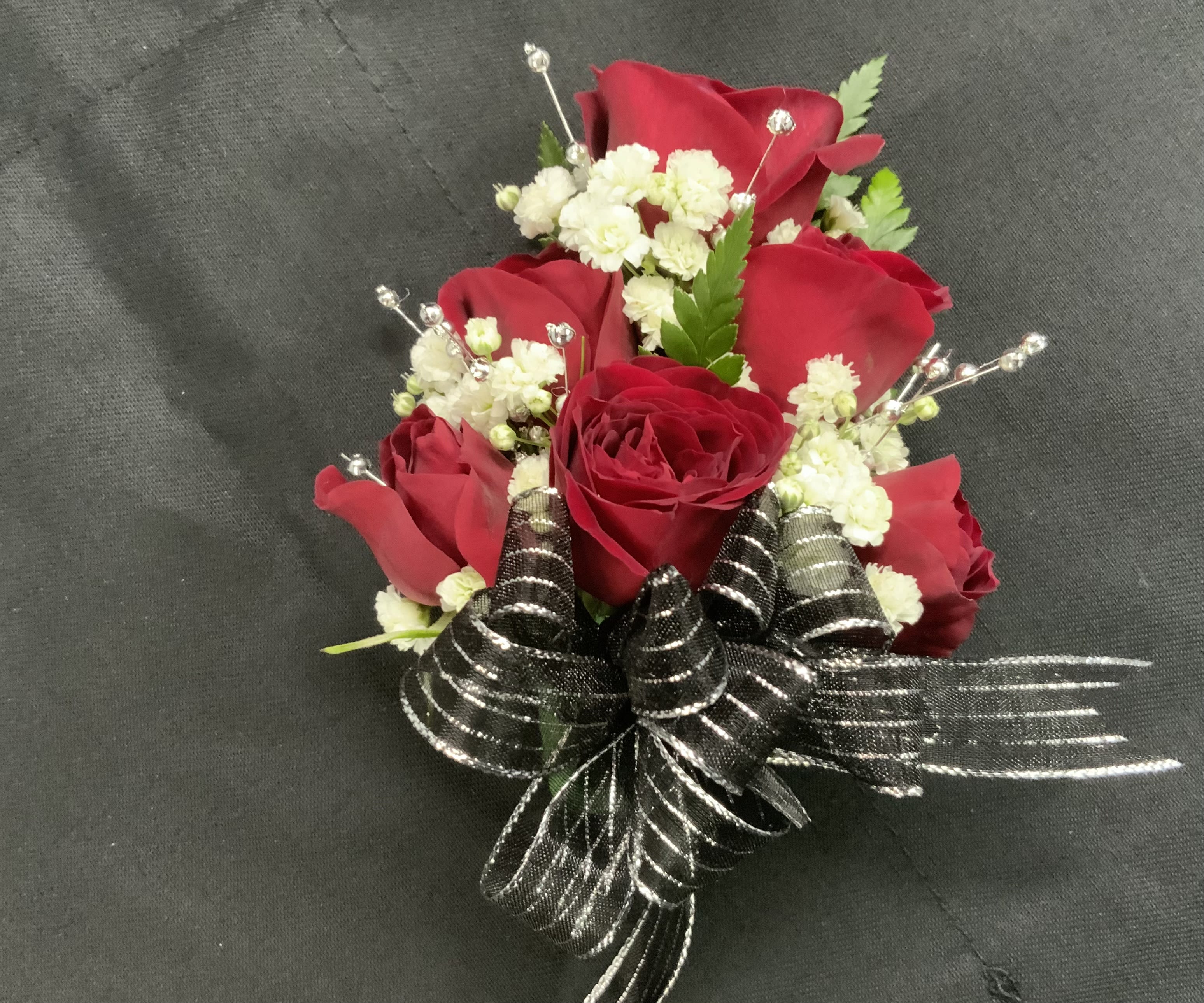 Spray Mini Rose Corsage - It's Prom Season the perfect time to get Your Corsage. A Different Color Rose is available upon request. A Different Color Bow is available upon request. Beads available only in Gold, Silver or White.