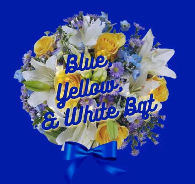 Blue, Yellow, &amp; White Designer's Choice Wrapped Bouquet - Celebrate your grad with this bright assortment of blue, yellow, &amp; white flowers wrapped in an elegant bouquet. 