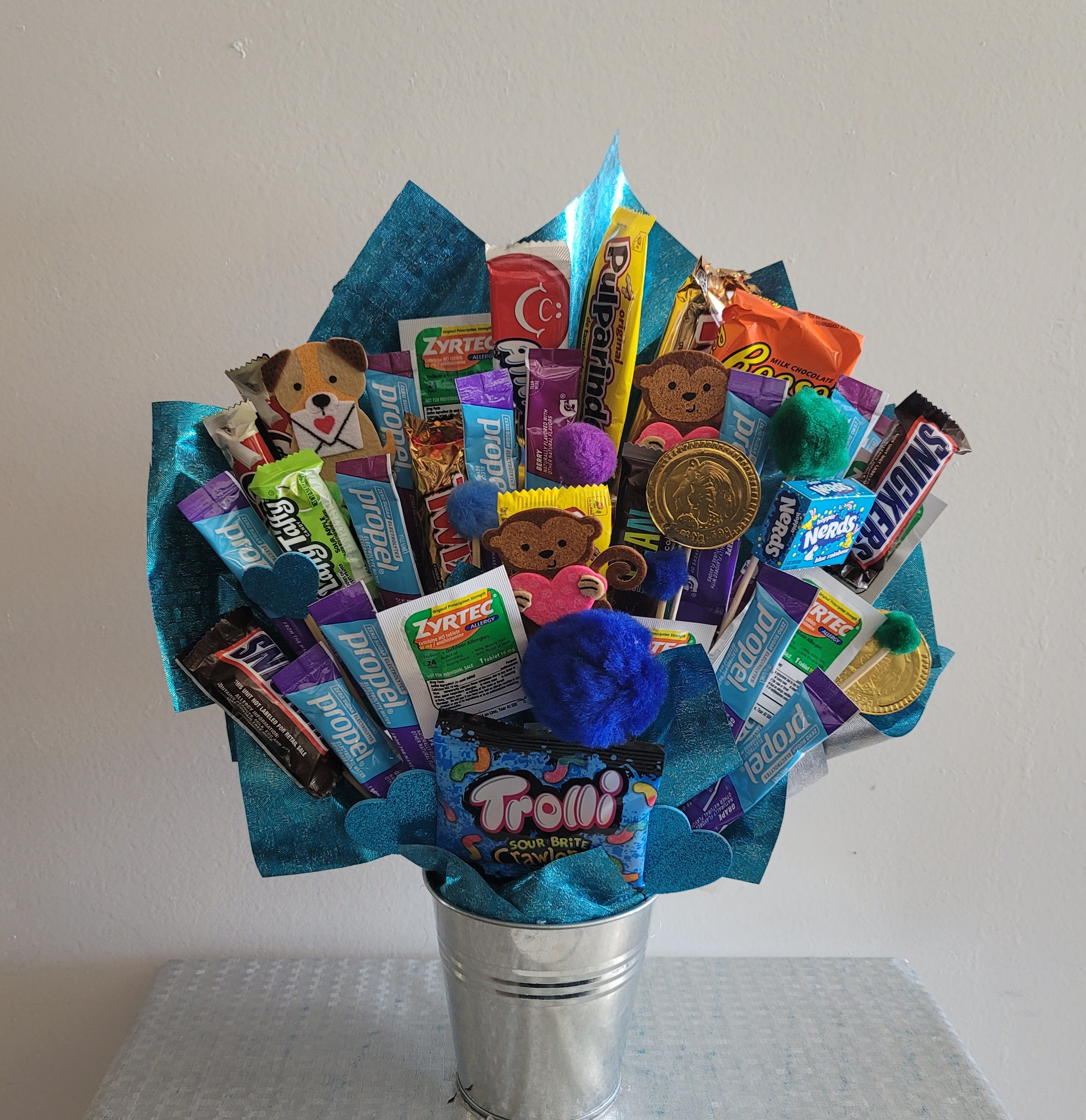 BLUE CANDY BOUQUE BY XOCHITL FLOWERS EP - NICE CANDY BOUQUET DECORATED IN BLUE FOR YOUR SPECIAL GIFT