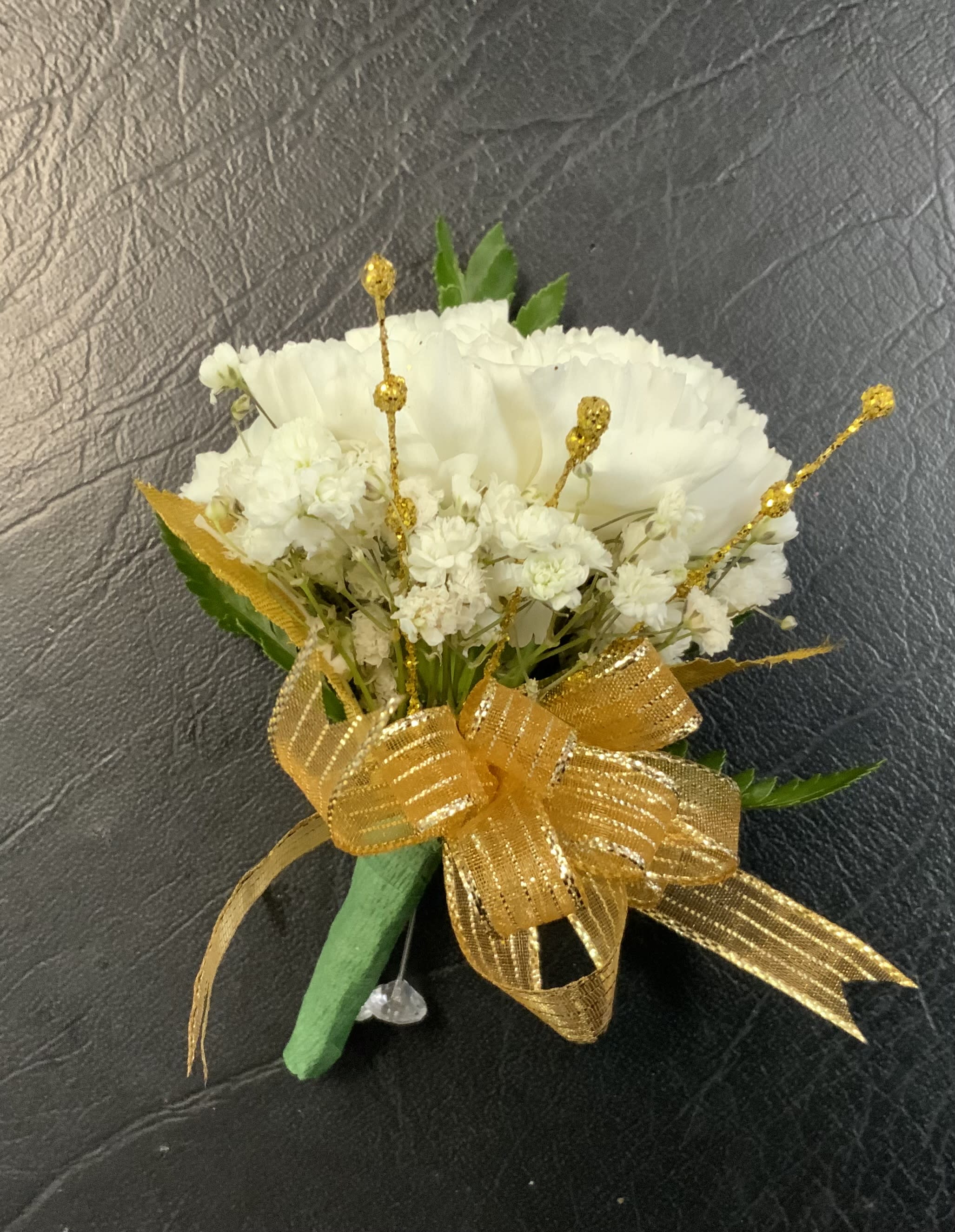 Carnation Boutonniere - It's Prom Season the perfect time to get Your Boutonniere A Different Color Carnation is available upon request. A Different Color Bow is available upon request. Beads available only in Gold, Silver or Pearls. Flower Bead available only in Gold or Silver.