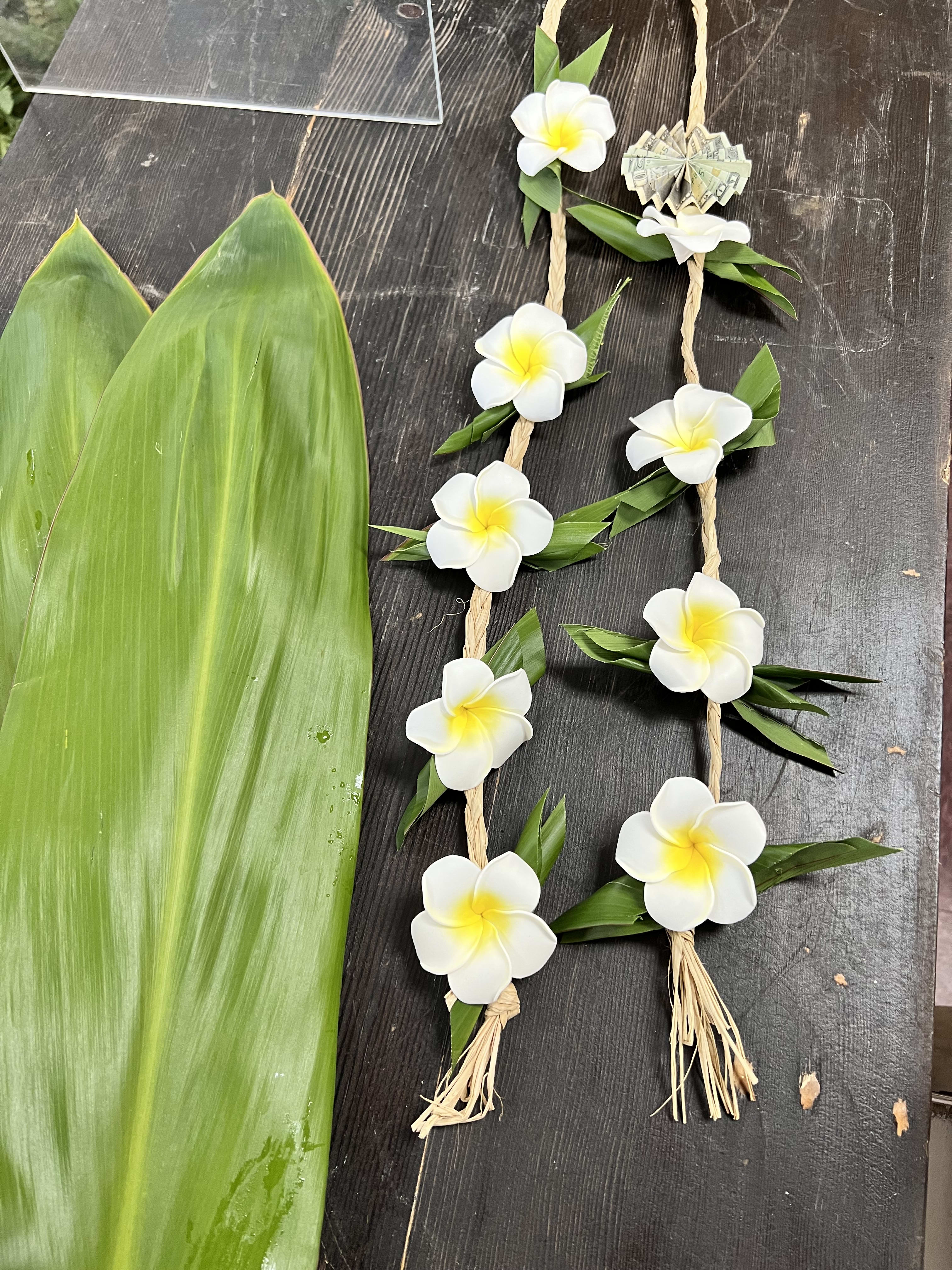 Graduation Lei - Graduation Leis made with the Plumeria and ti leaf. you can add money on it.