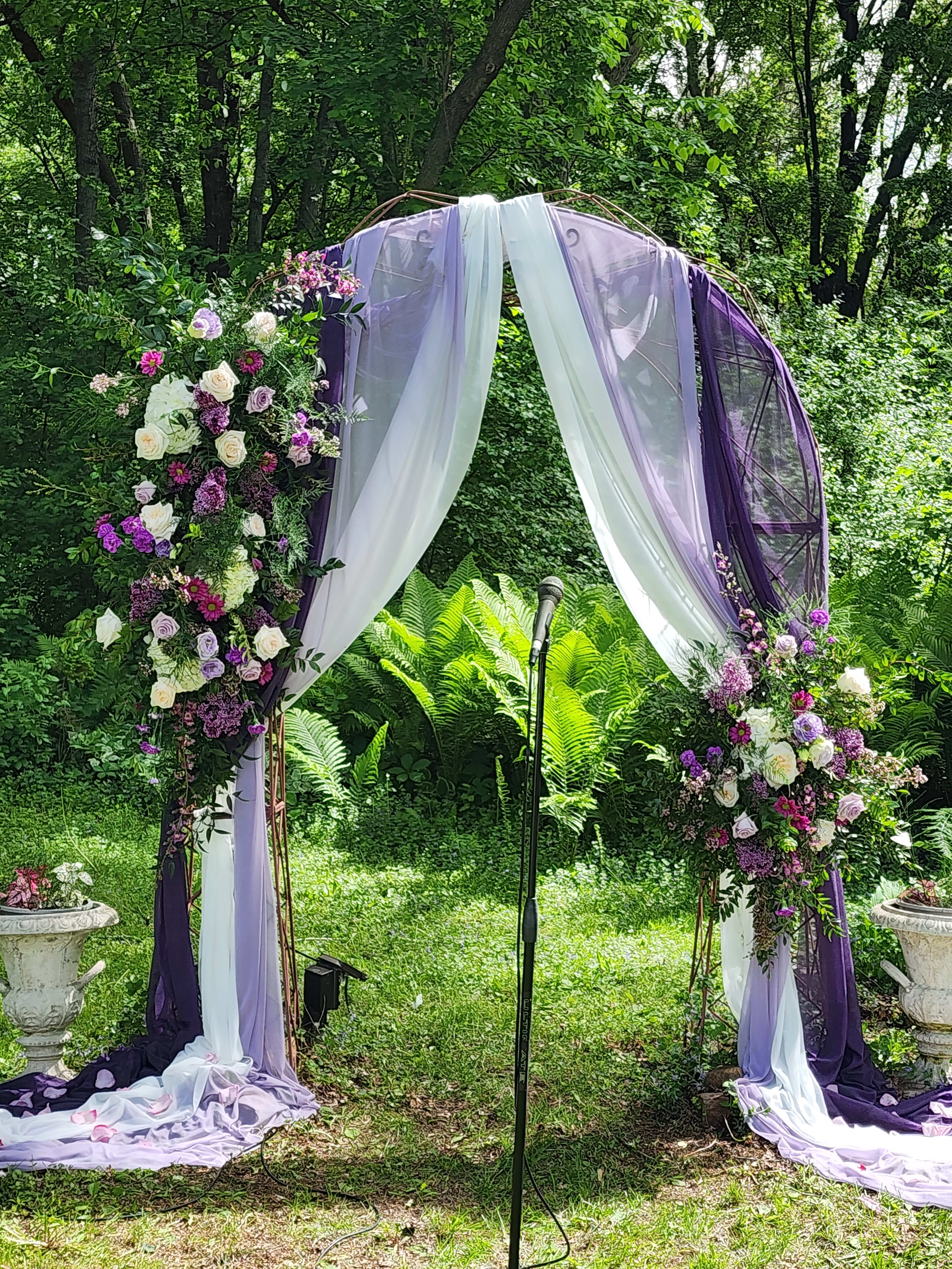 Lavender Wedding Arch - Love is in the air when your nuptials are exchanged in front of this grand floral arch.