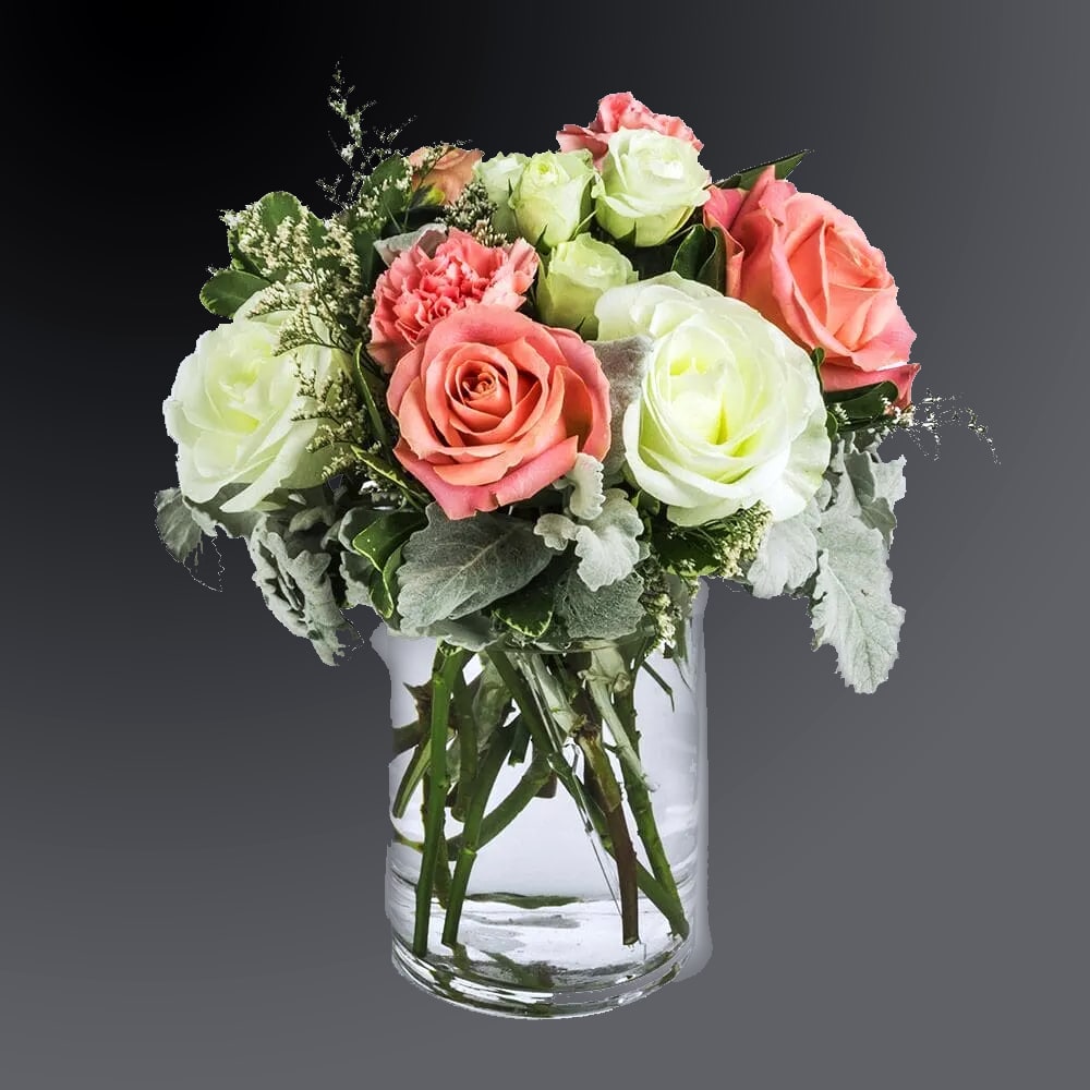 Sweet &amp; Subtle by BloomNation™ - This arrangement includes pink roses, white roses, white spray roses, pink carnations, and dusty miller. Sweet &amp; Subtle by BloomNation™ is the perfect gift for a birthday, thank you, or just because.   APPROXIMATE DIMENSIONS: 9&quot; H X 10&quot; W