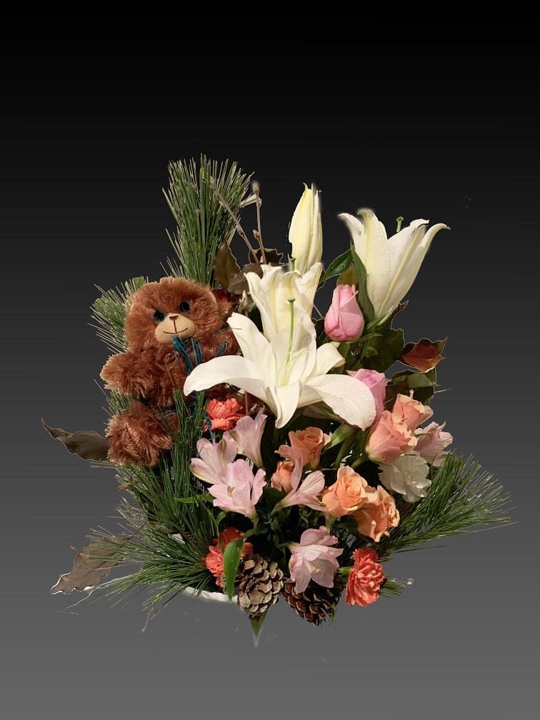 Get better Bouquet - Wish them a speedy recovery with this hand-delivered, thoughtful surprise of fresh mixed flowers and sweet snuggles from this charming Beary Well Bear plush bouquet! This cheerful arrangement includes orange roses, orange alstroemeria, red carnations, lavender aster matsumotos and yellow daisy spray chrysanthemums, accented with yellow solidago, variegated pittosporum, spiral eucalyptus, huckleberry and lemon leaf.