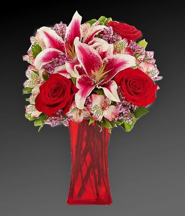 Forever Romance Forever Romance - A love that will last a lifetime, a bouquet that will tell them just that. This Forever Romance Bouquet is the perfect gift to tell someone that you have that special kind of love. Beautiful red roses surrounded by stargazer lilies in a wonderfully elegant vase. Make someone's day special